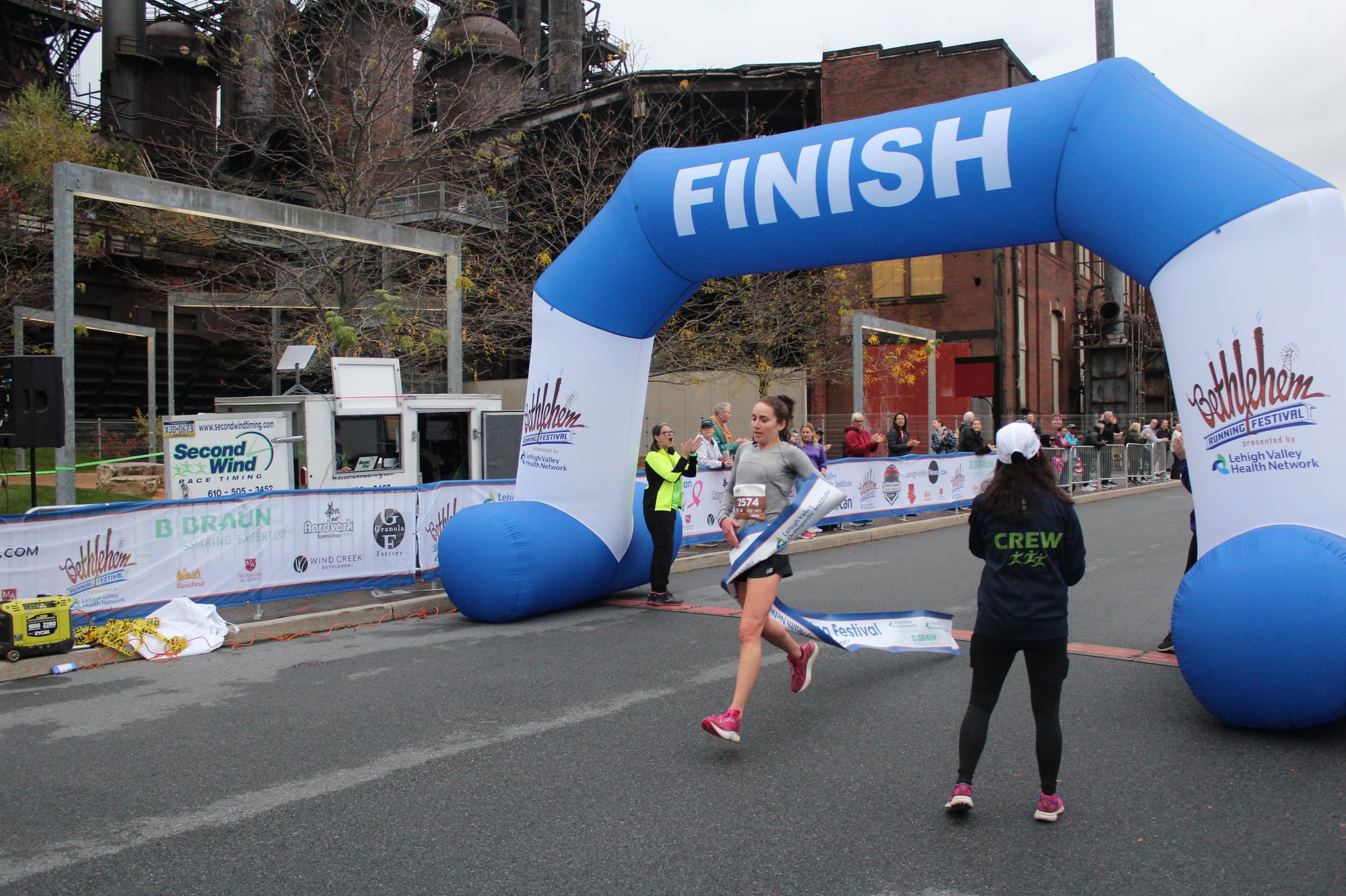 A runner finishes a race at the Bethlehem Running Festival's first day.