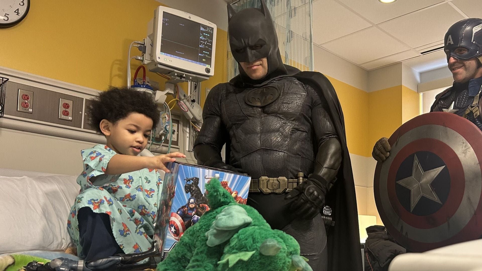 A group of firefighters dressed as superheroes to brighten the day of pediatric patients at St. Luke's University Health Netw