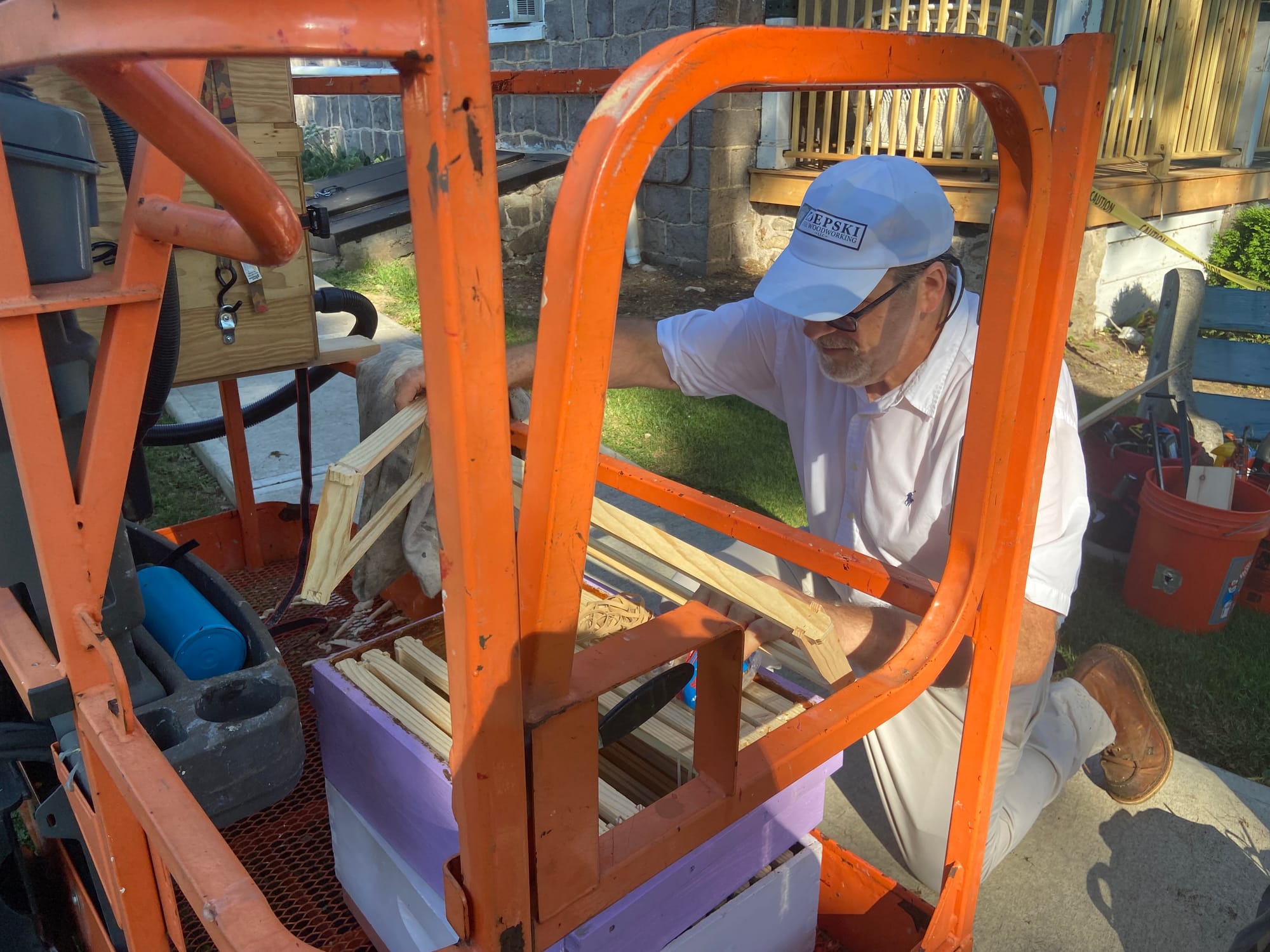 James Zdepski, a beekeeper and carpenter, removed a colony of bees Wednesday from the Riegelsville's borough hall.