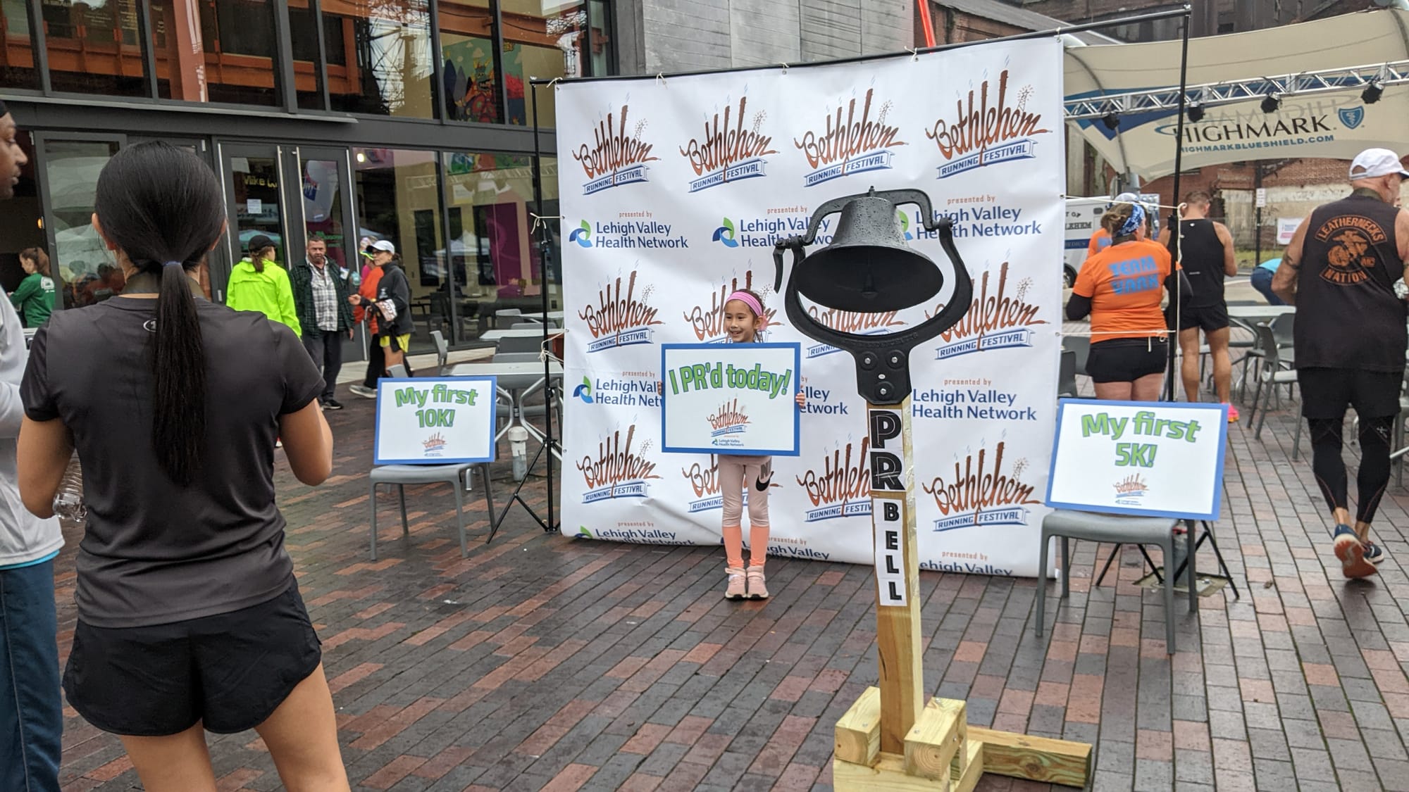 The photo stand for the Bethlehem Running Festival. In running, "PR" stands for "personal record."