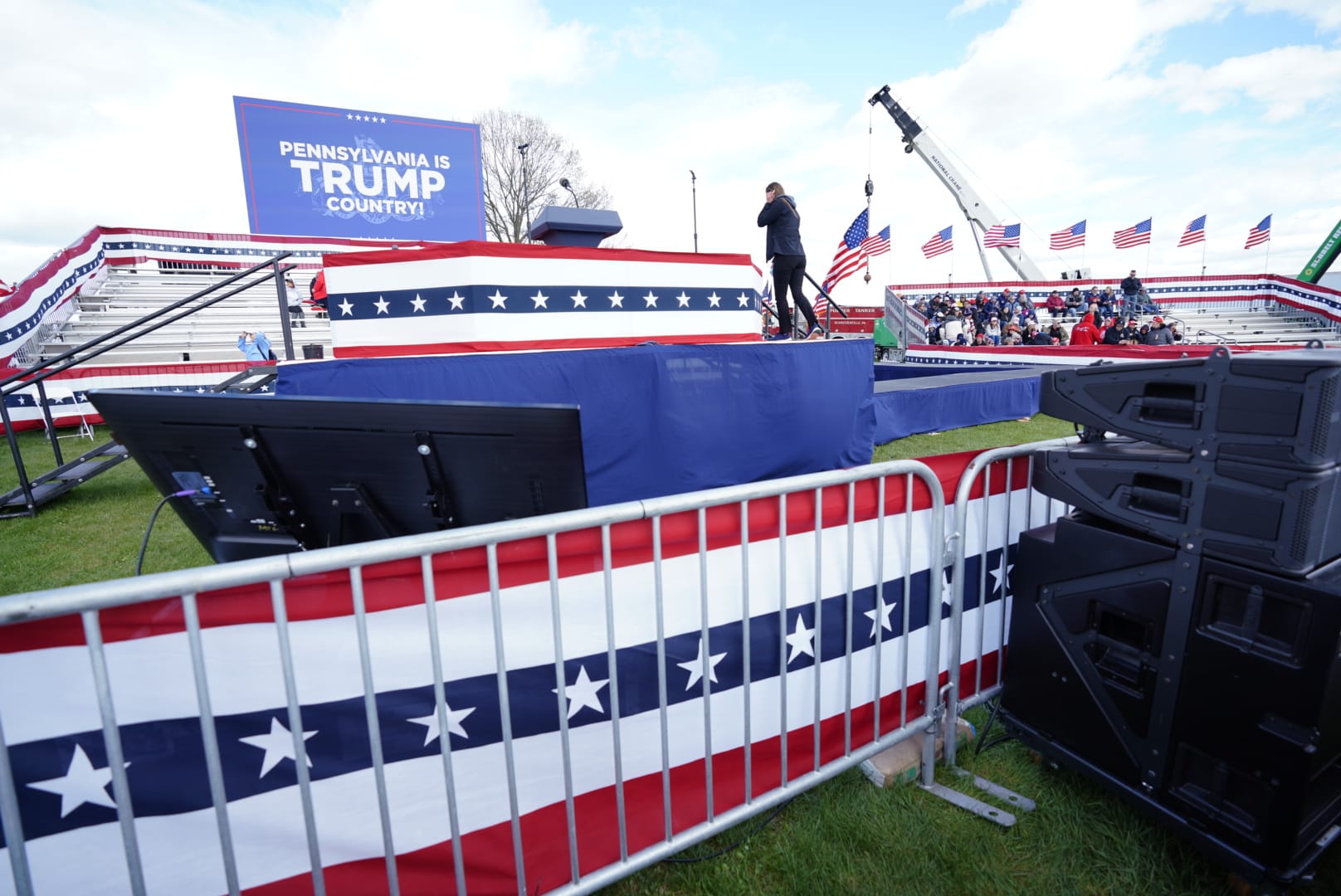 People wait for Donald Trump prior to a rally in Schnecksville on Saturday, April 13, 2024.