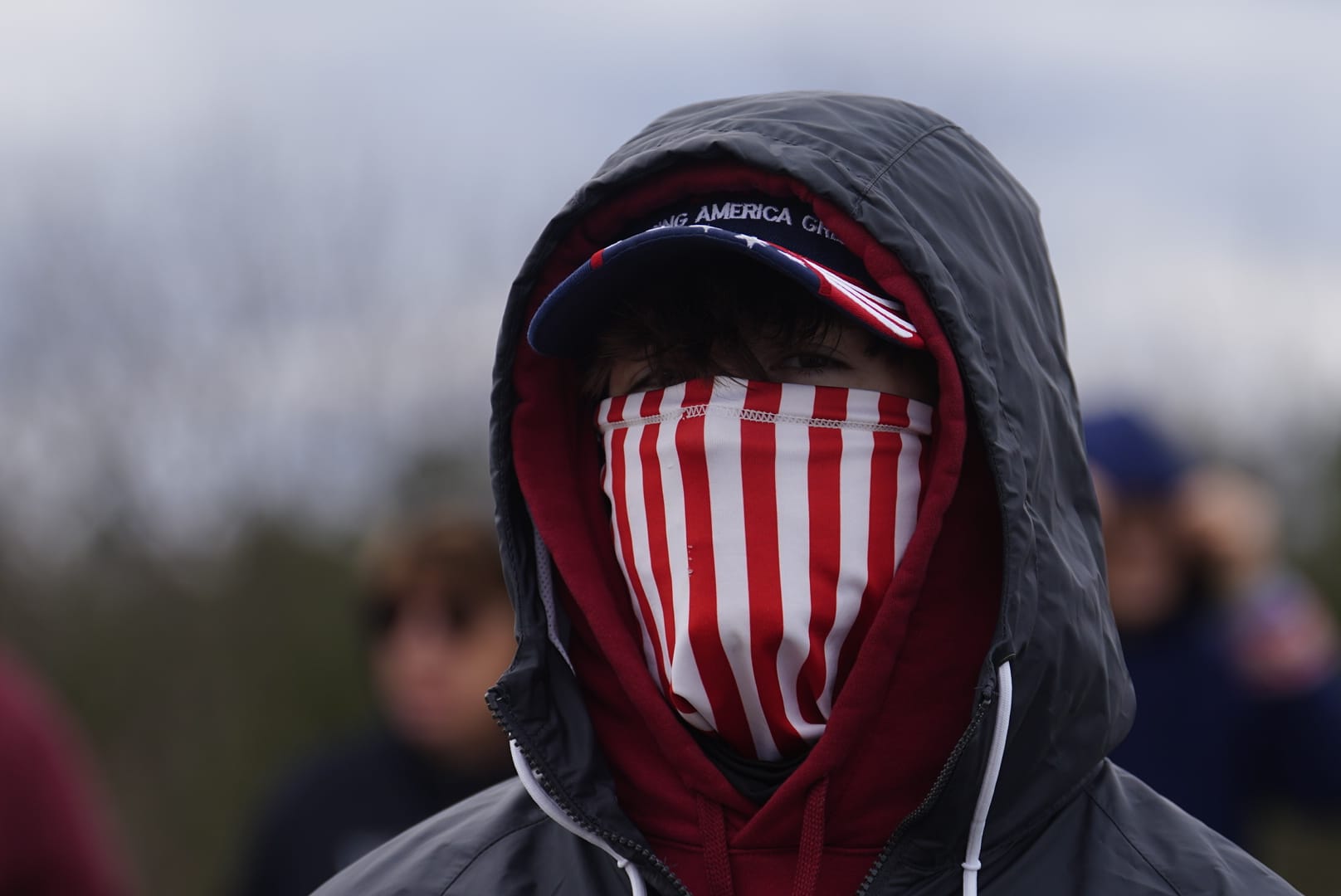 People wait for Donald Trump prior to a rally in Schnecksville on Saturday, April 13, 2024.