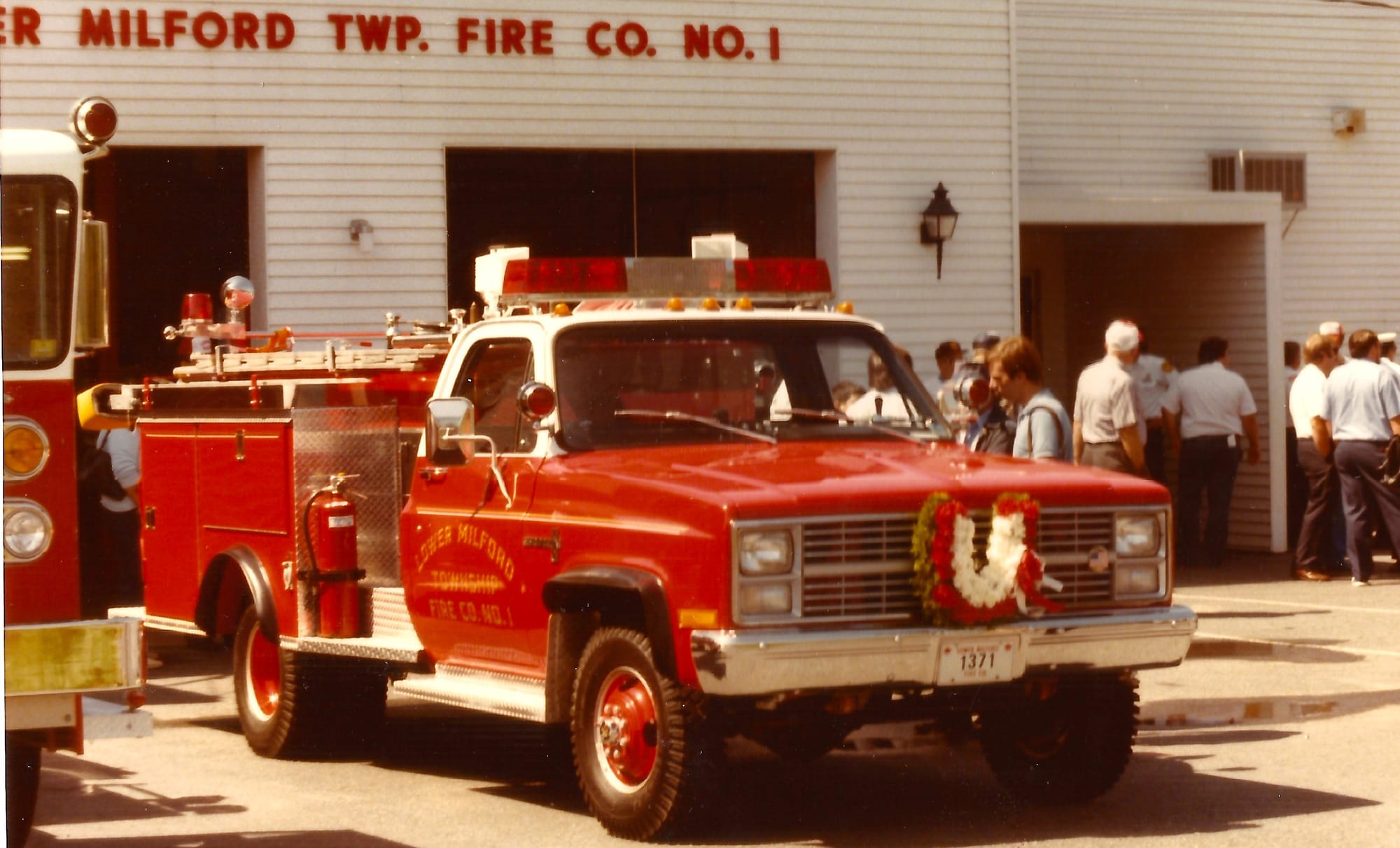 The 1983 Pierce is the center of attention following a September 8, 1984 parade and housing ceremony at the Lower Milford Fir