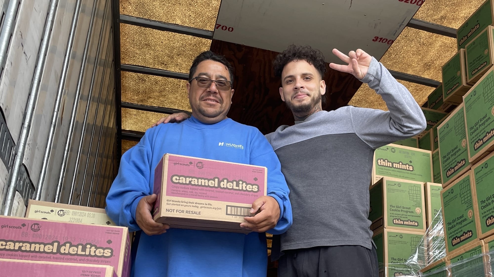 Father-son duo Roberto and Edgar Venegas helped unload the massive haul of cookies.