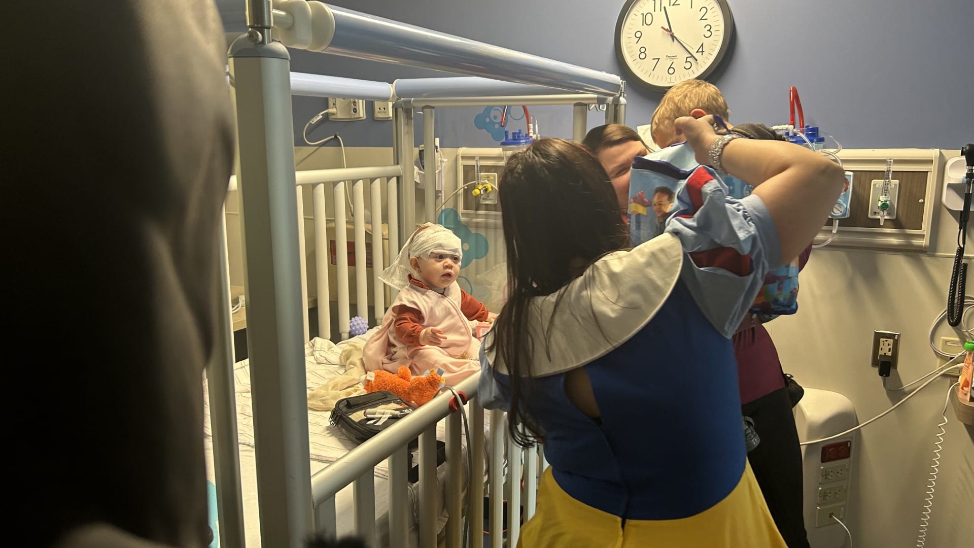 A group of firefighters dressed as superheroes to brighten the day of pediatric patients at St. Luke's University Health Netw