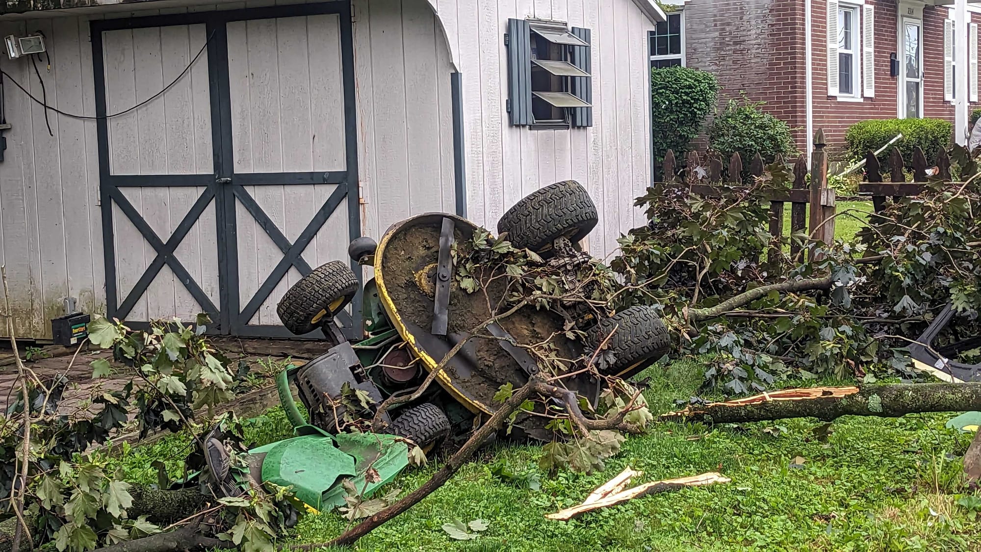 The same house damaged by the storm.