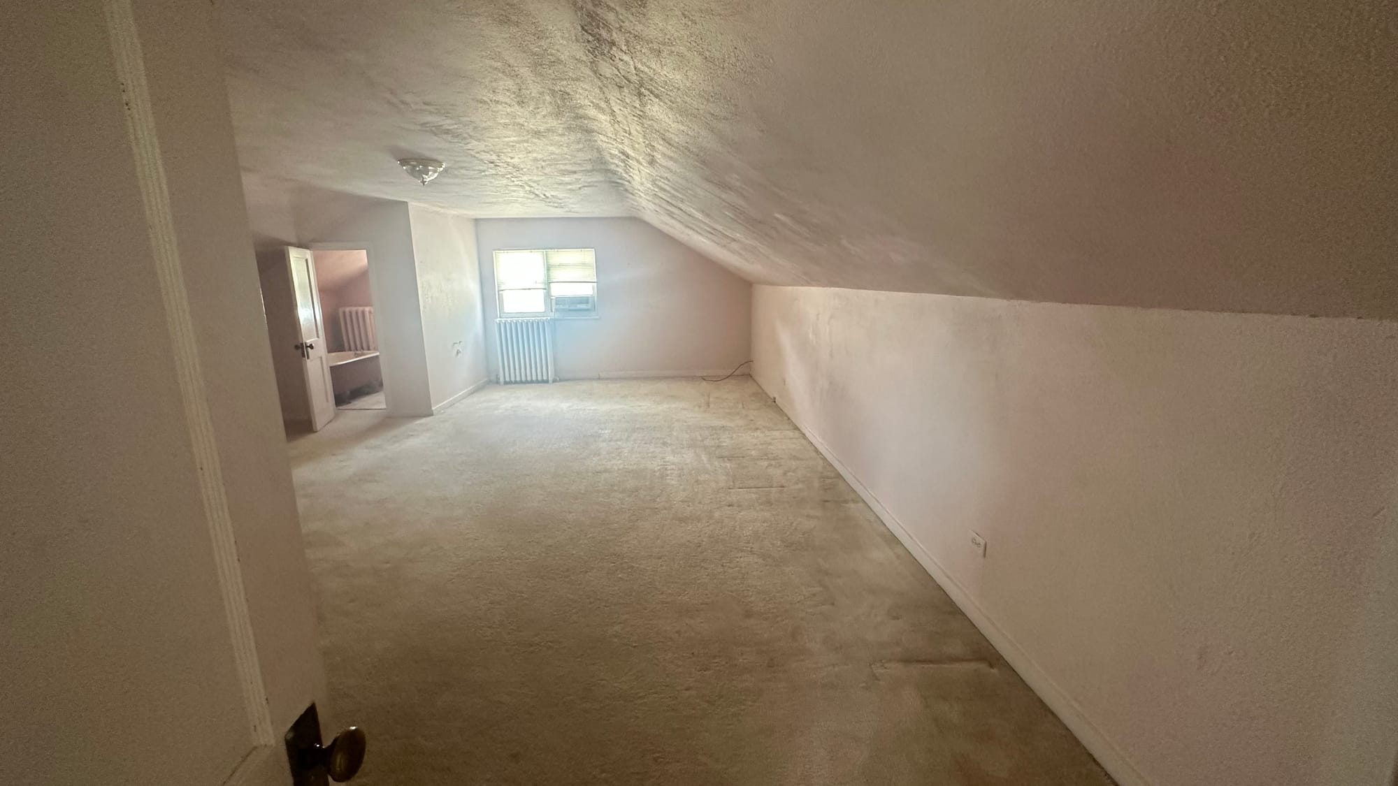 The upstairs bedrooms and bathroom of a West Bethlehem home prior to renovation.