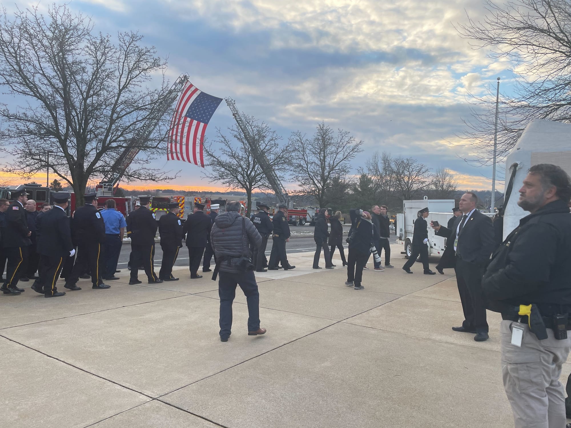 Hundreds line up to pay respects to fallen firefighters.