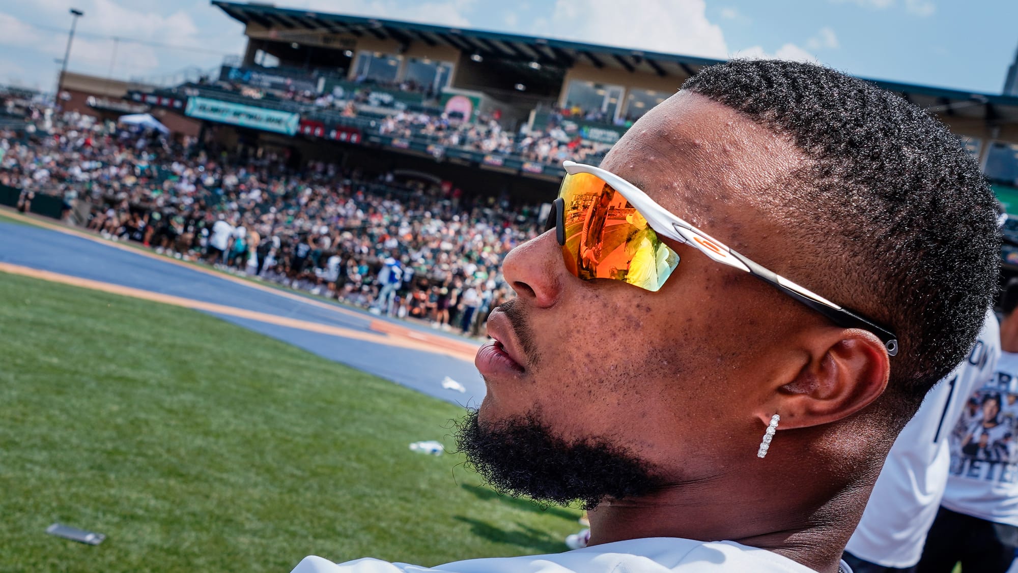 Saquon Barkley of New York Giants watches the field action. The 2nd annual DeVonta Smith Celebrity Softball Game was held at 
