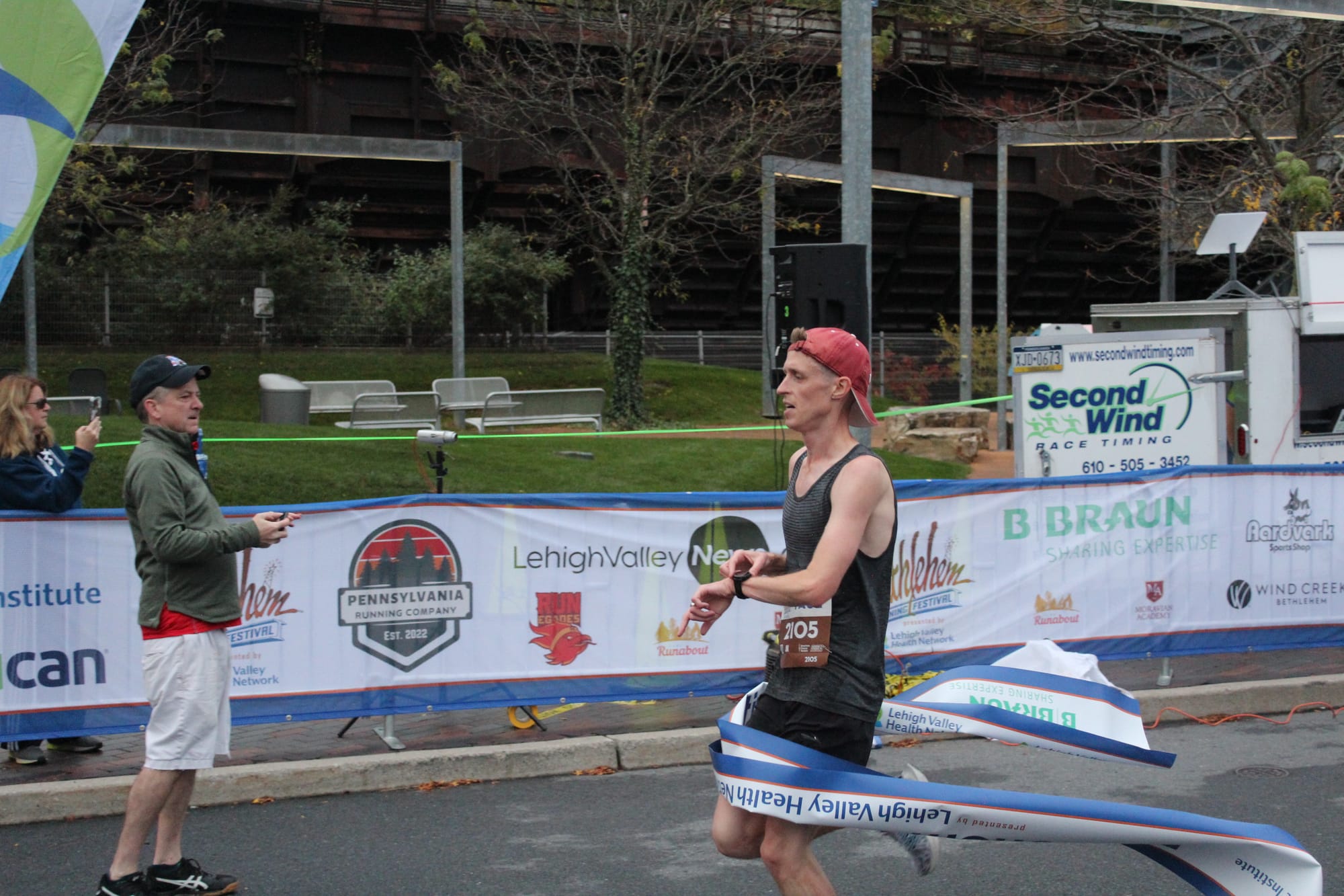 A runner finishes a race at the Bethlehem Running Festival's first day.