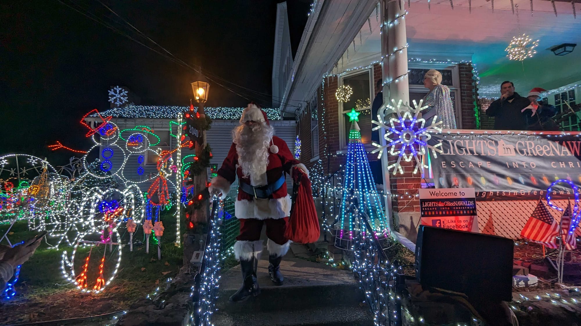 Santa is introduced during Opening Night festivities for the Lights in Greenawalds.