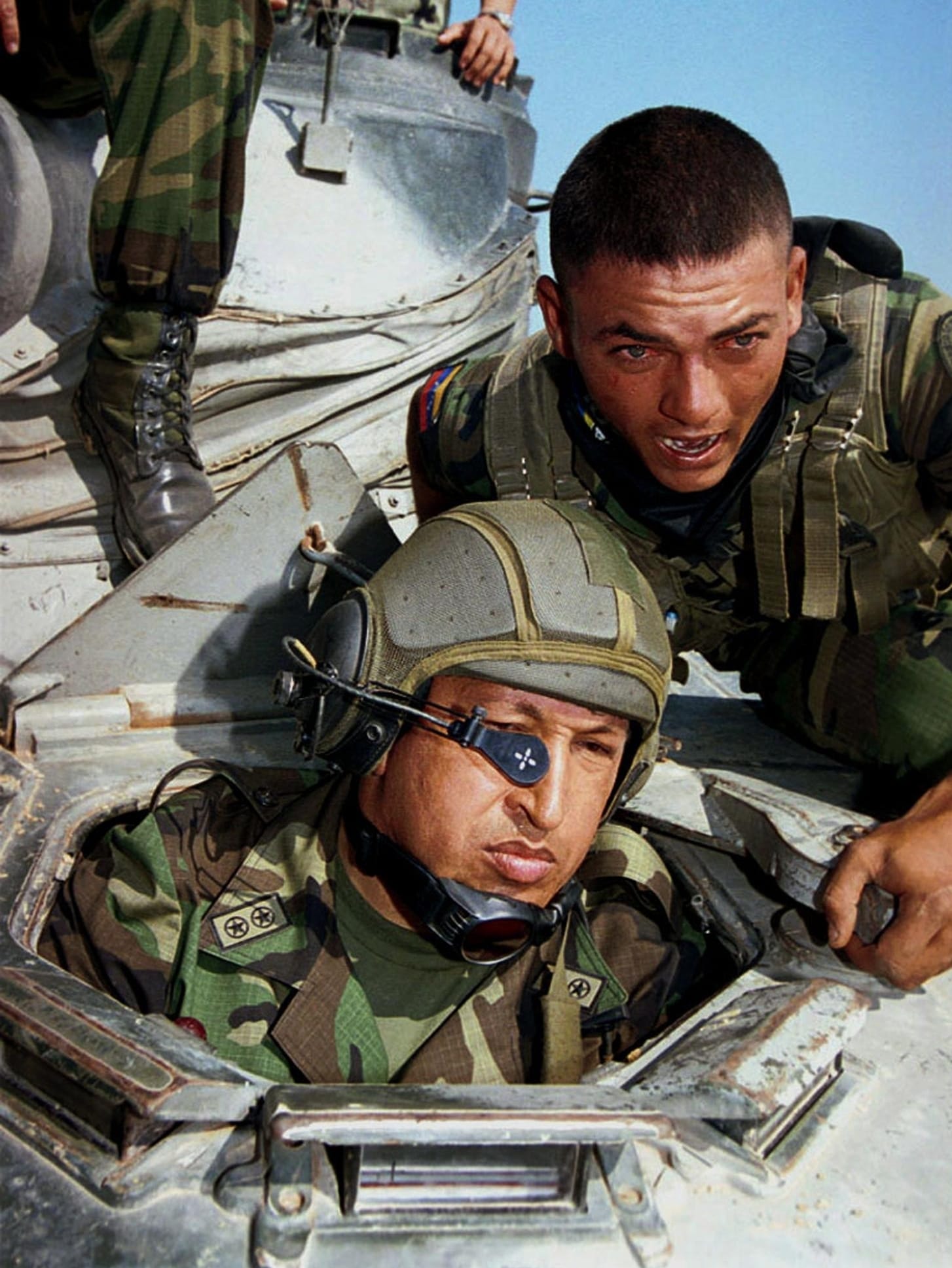 Chavez inspects the Air Force in Catilletes, near the border with Colombia, in March 2001.
