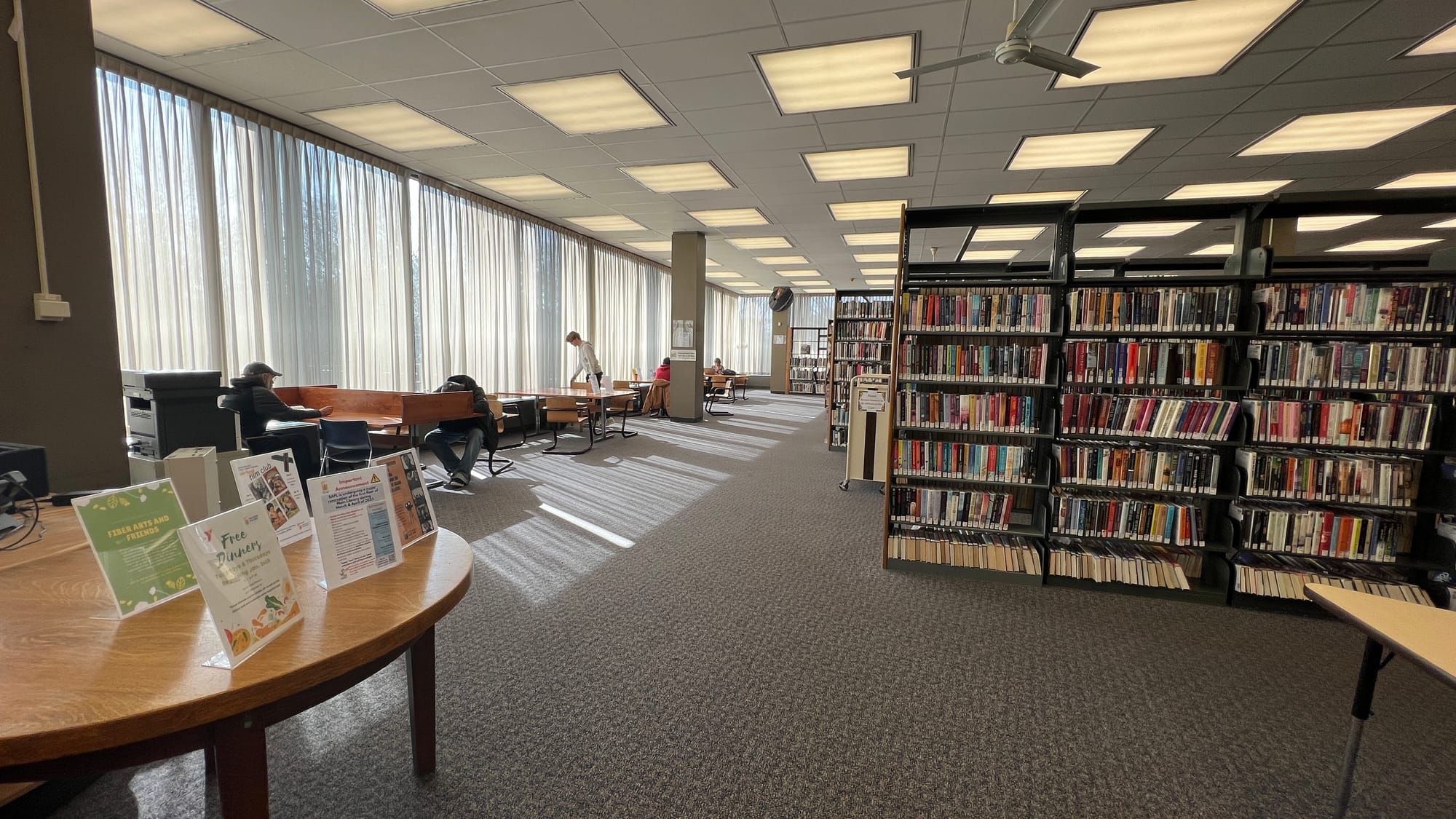 The Bethlehem Area Public Library's main branch houses the front desk, adult books and communal workspaces on the first floor
