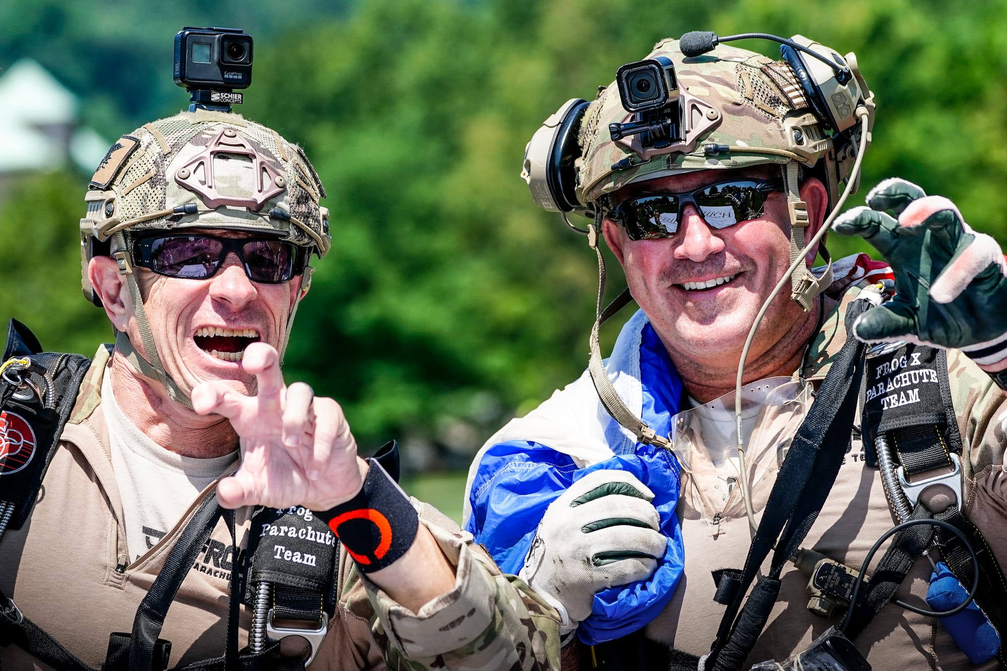 Larry Barbiero, left, and Marc Hogue make a claw post-dive. U.S. Special Forces members including U.S. Navy SEALs skydive fro