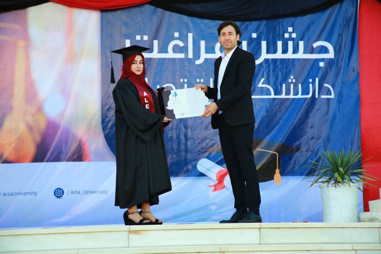 Rohullah Balkhi at a student graduation.