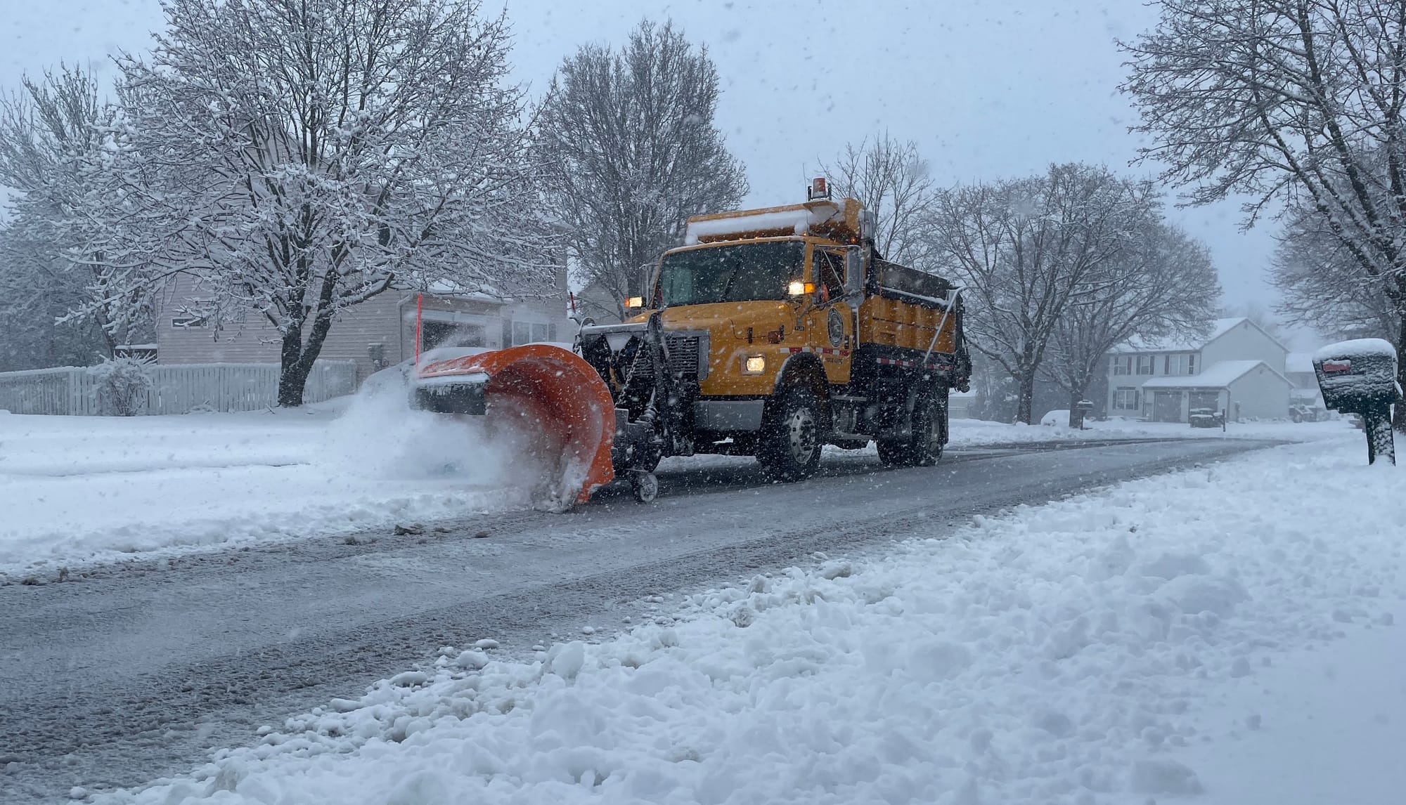 A plow clears the roads in Palmer Township early Tuesday.