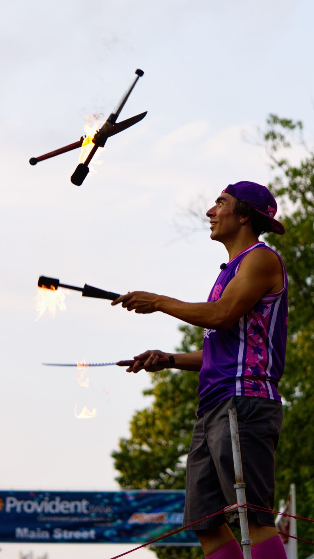 Sam Malcolm also juggles while balanced on an unsupported ladder.