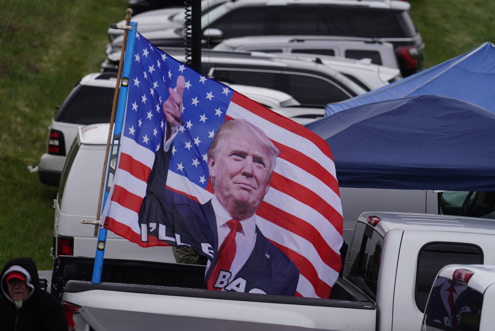 People wait for Donald Trump prior to a rally in Schnecksville on Saturday, April 13, 2024.