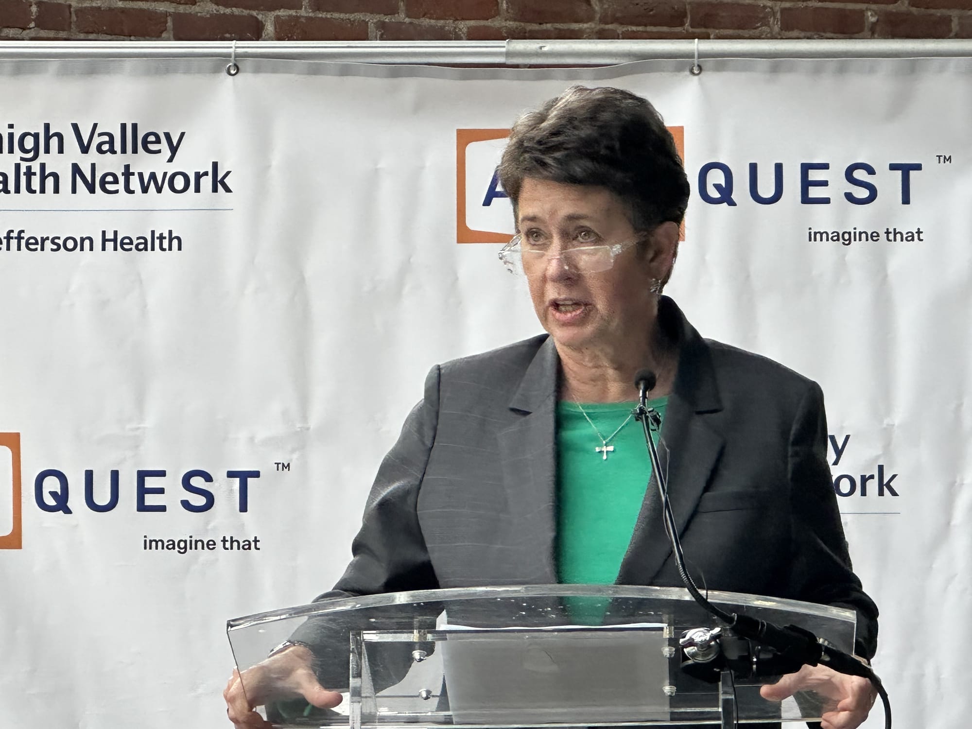 ArtsQuest Chief Executive Officer speaks at a "brick-breaking' event Thursday to formally kick off renovation of Bethlehem St
