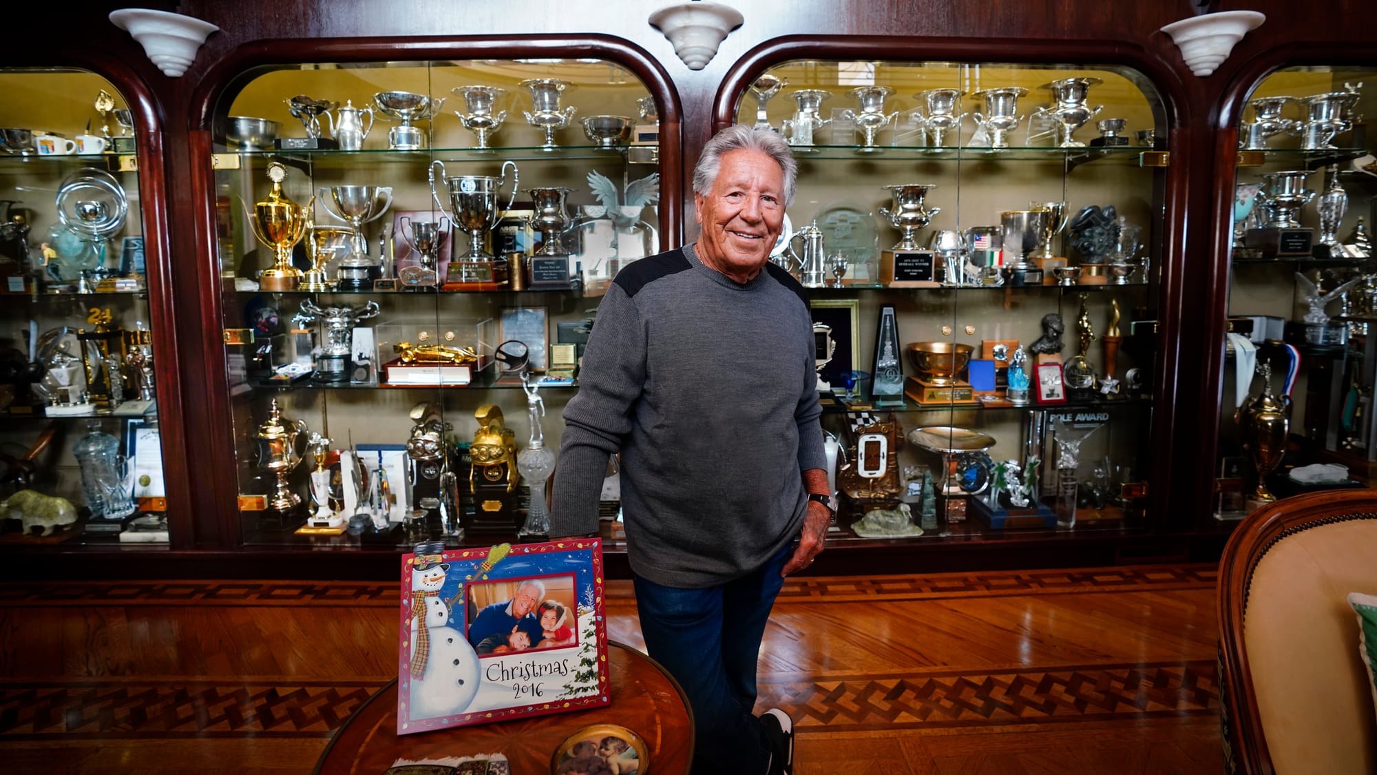 Race driver Mario Andretti poses for a portrait at his home in Nazareth, Pa. on Wednesday, March 20, 2024. Photography by Don