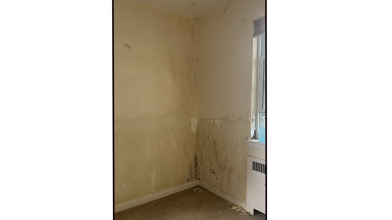 The office 'before' the West Bethlehem renovation. Wallpaper was scraped from the walls and the ceiling.