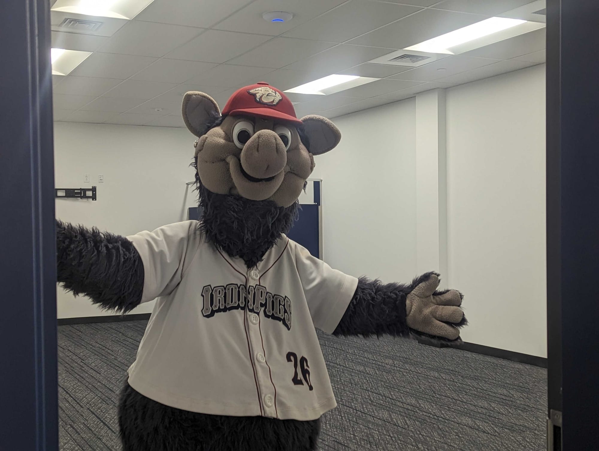 Ferrous of the IronPigs in his new locker room.