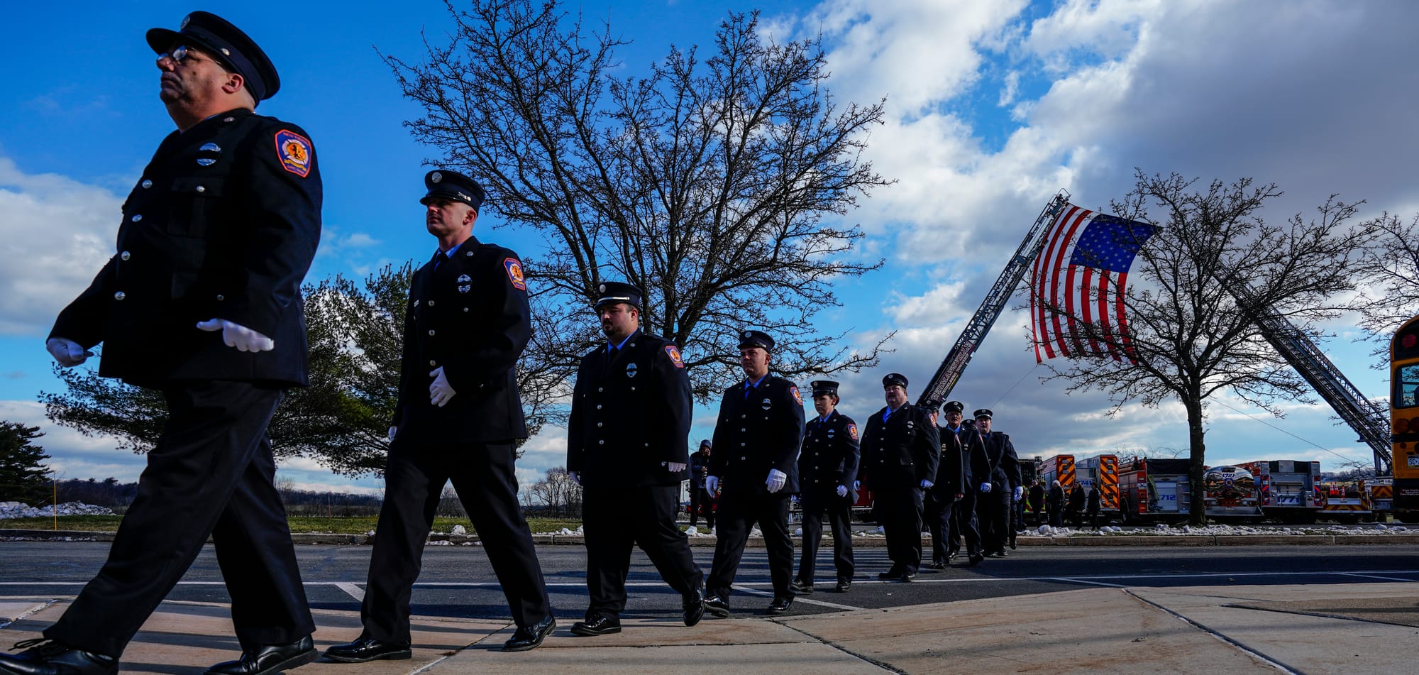 New Tripoli firefighters enter the school. Mourners gather at Northwestern Lehigh Middle School in New Tripoli, Lehigh County