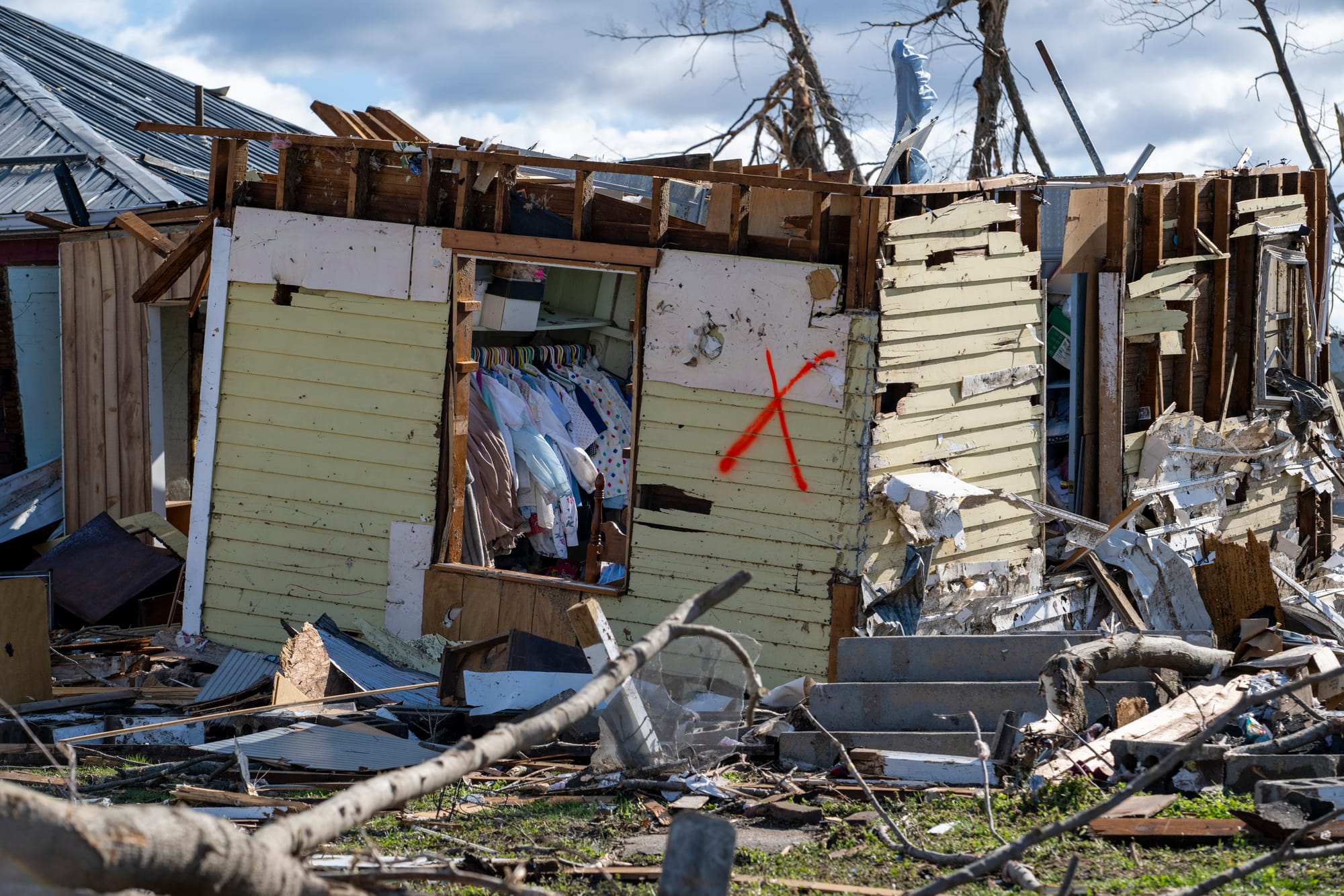 Damage from a late-night tornado is seen in Sullivan, Ind., Saturday, April 1, 2023. Multiple deaths were reported in the are