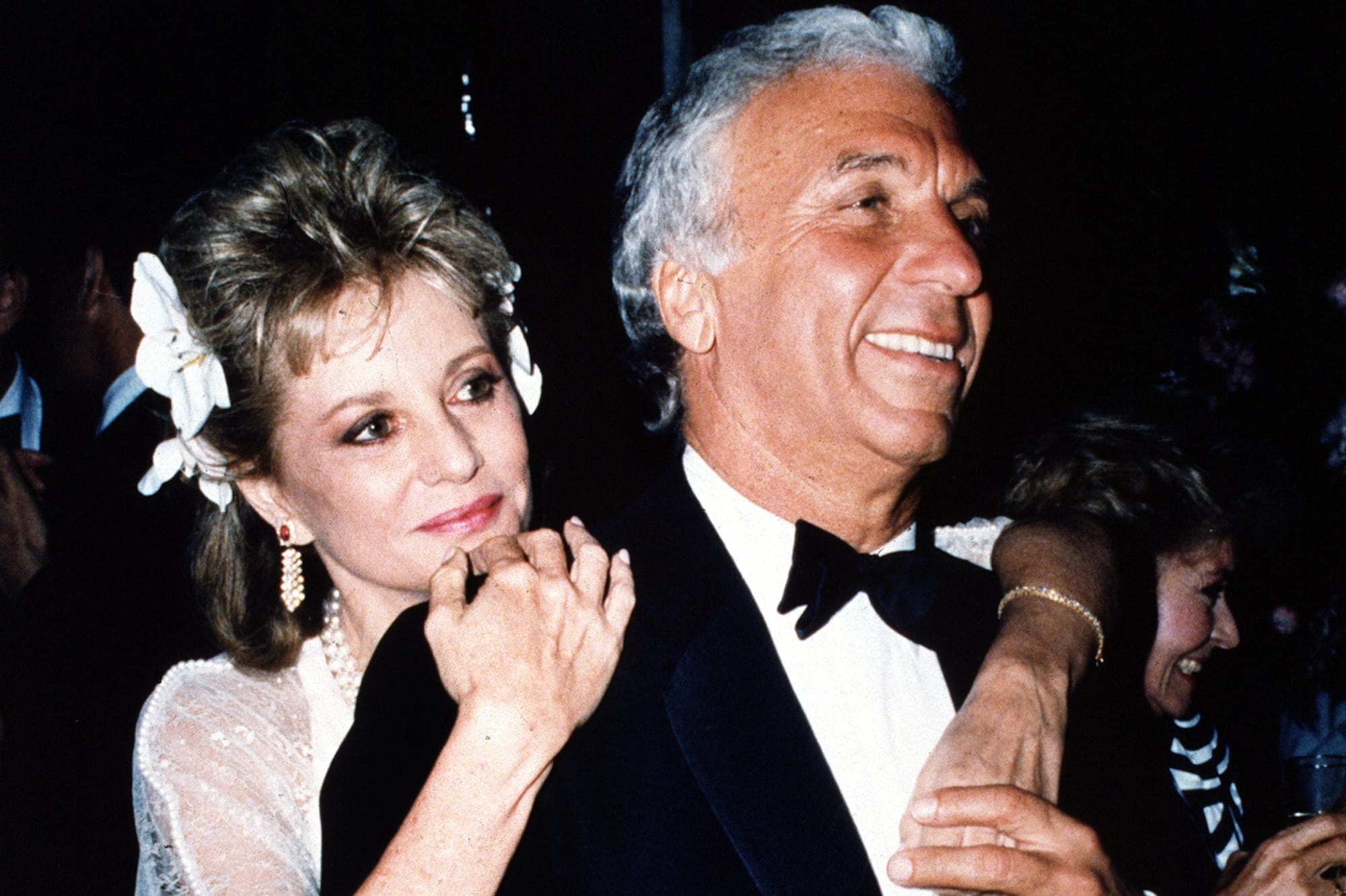 Walters, pictured here with Lorimar Telepictures Chairman Merv Adelson at their wedding ceremony on May 10, 1986.