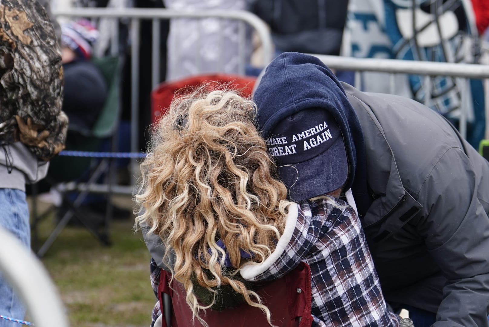 People gather ahead of Donald Trump's rally in Schnecksville, Pa. on Saturday, April 13, 2024.