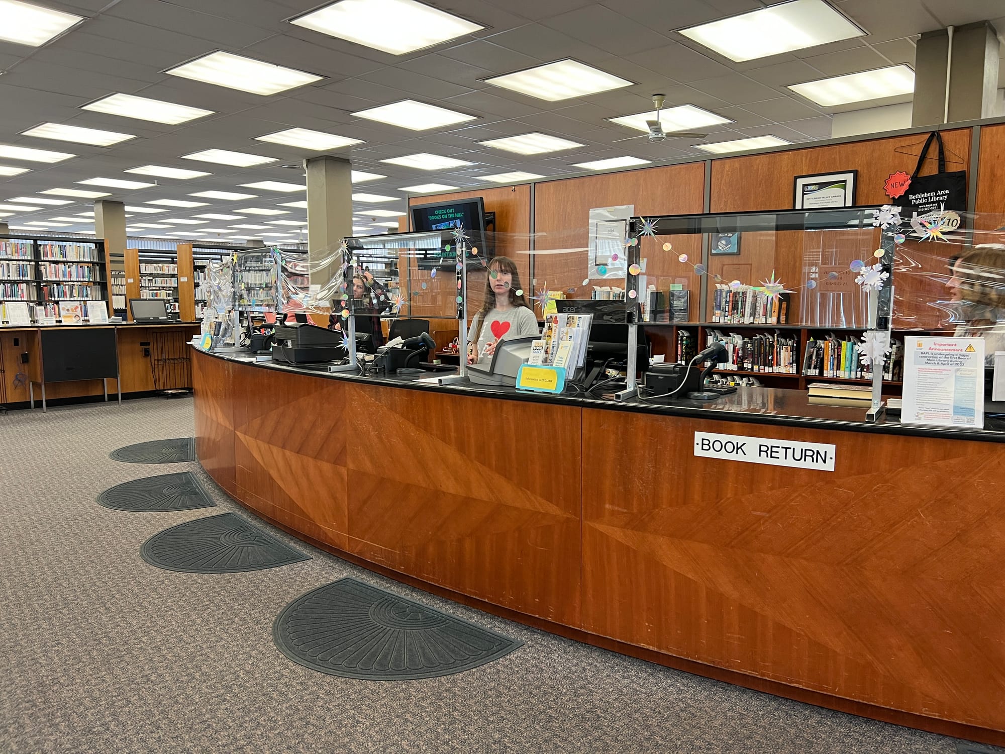 The Bethlehem Area Public Library's main branch houses the front desk, adult books and communal workspaces on the first floor