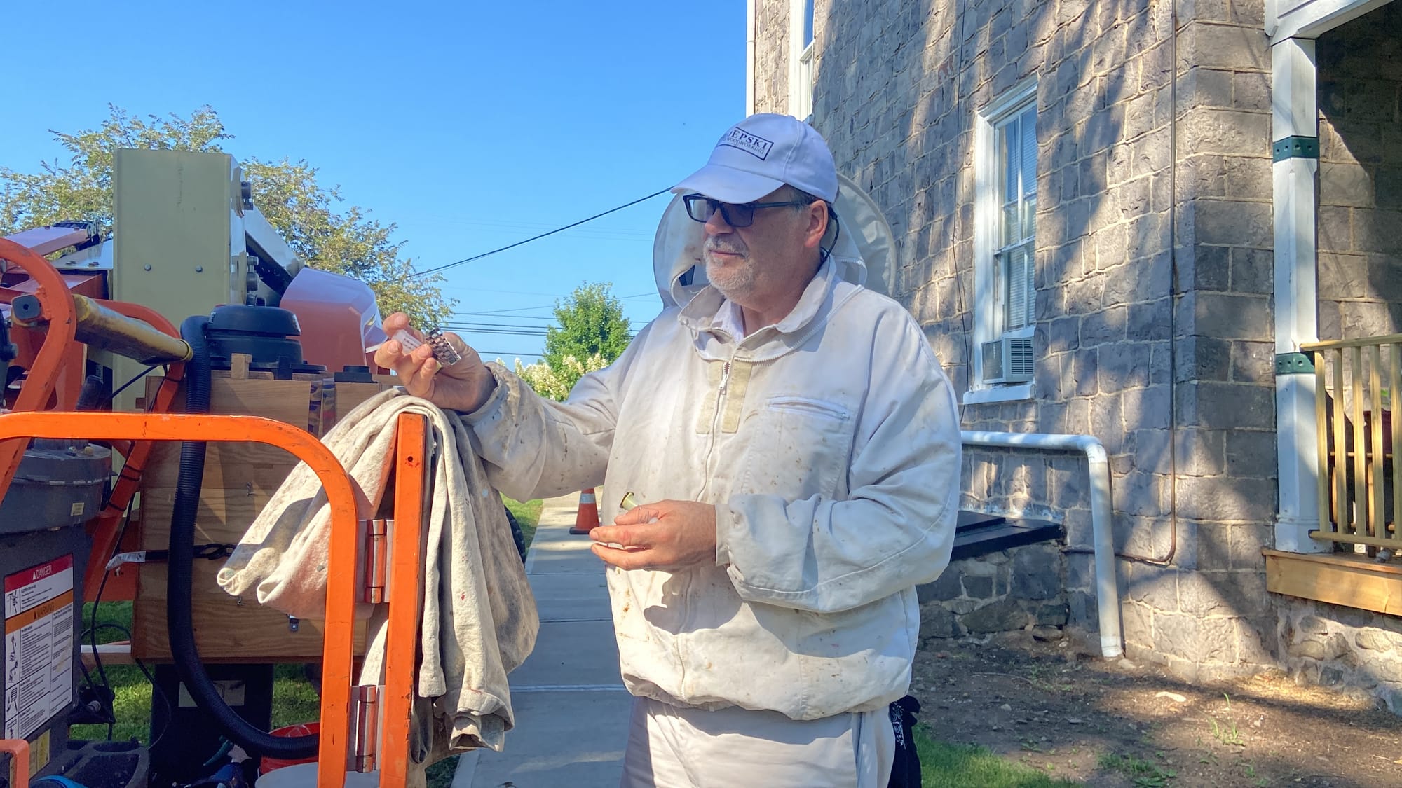 James Zdepski, a beekeeper and carpenter, removed a colony of bees Wednesday from the Riegelsville's borough hall.