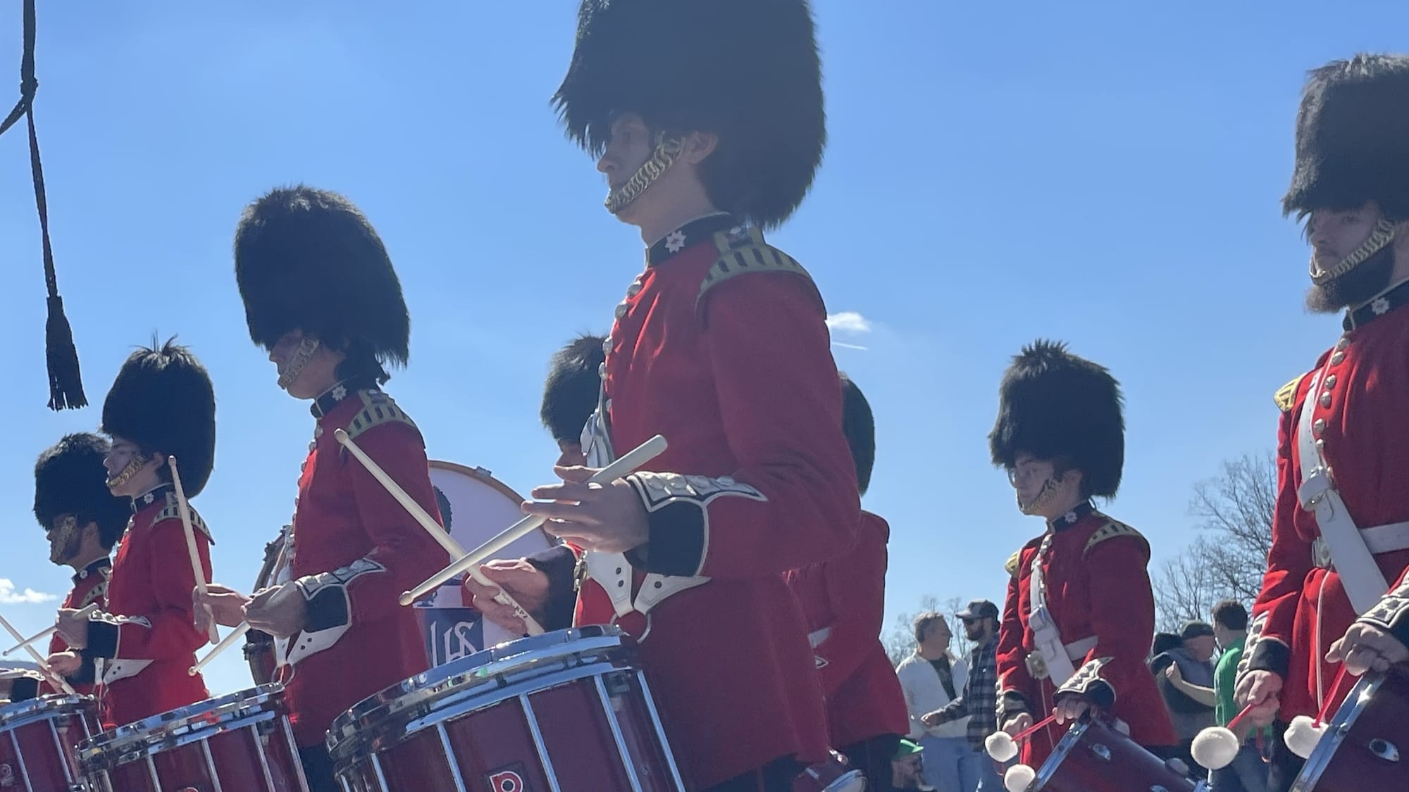 The Liberty High School Grenadier Band parades down the Broad Street Bridge for the Parade of Shamrocks on March 16, 2024.