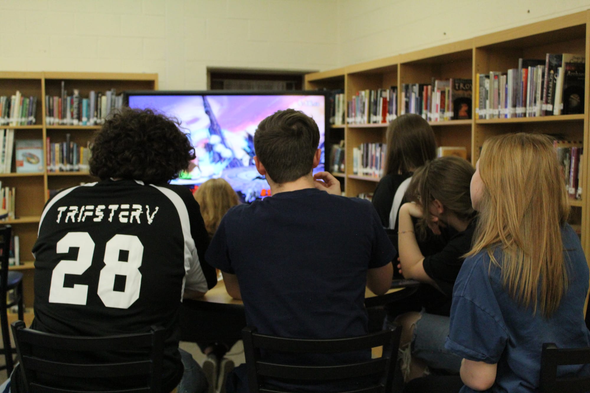 Students look on to cheer and support during an online Super Smash Bros. Ultimate match at Nazareth Area High School