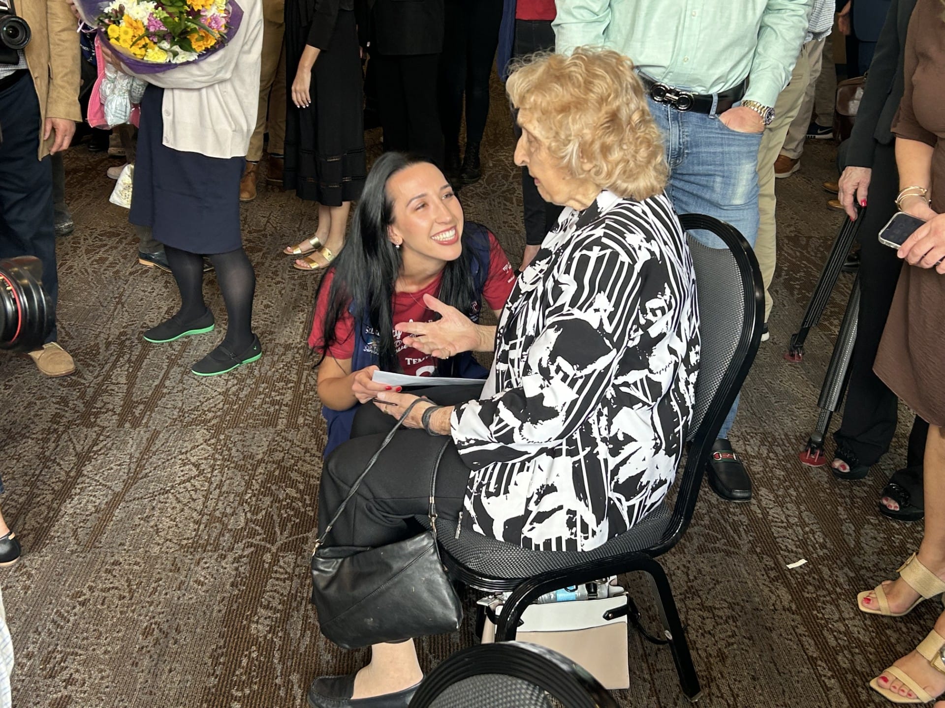 Kate Arner shares special moment with her 96-year-old grandmother, Catherine Burker.