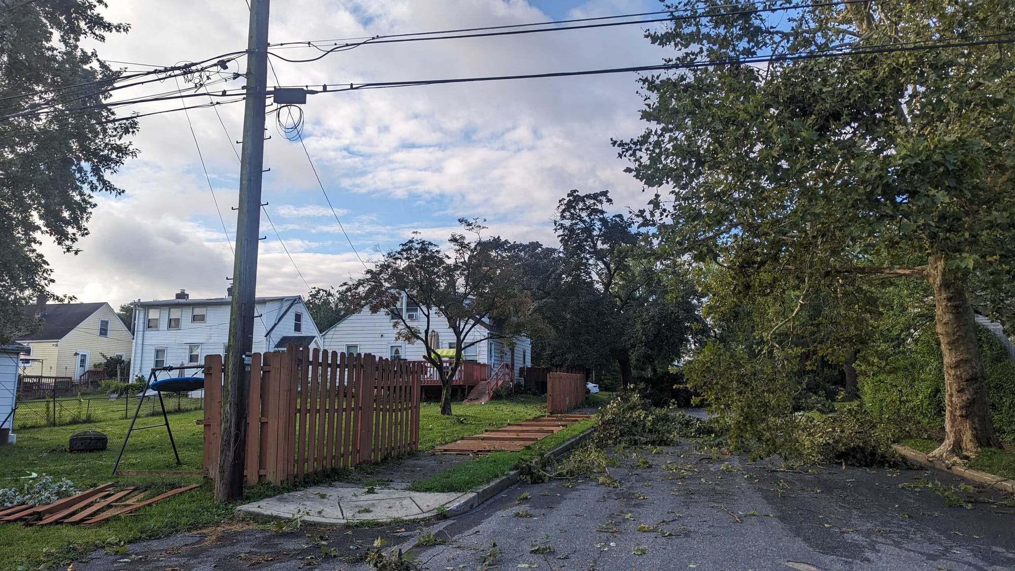 The entire yard was once fenced in on the left on Wahneta St.
