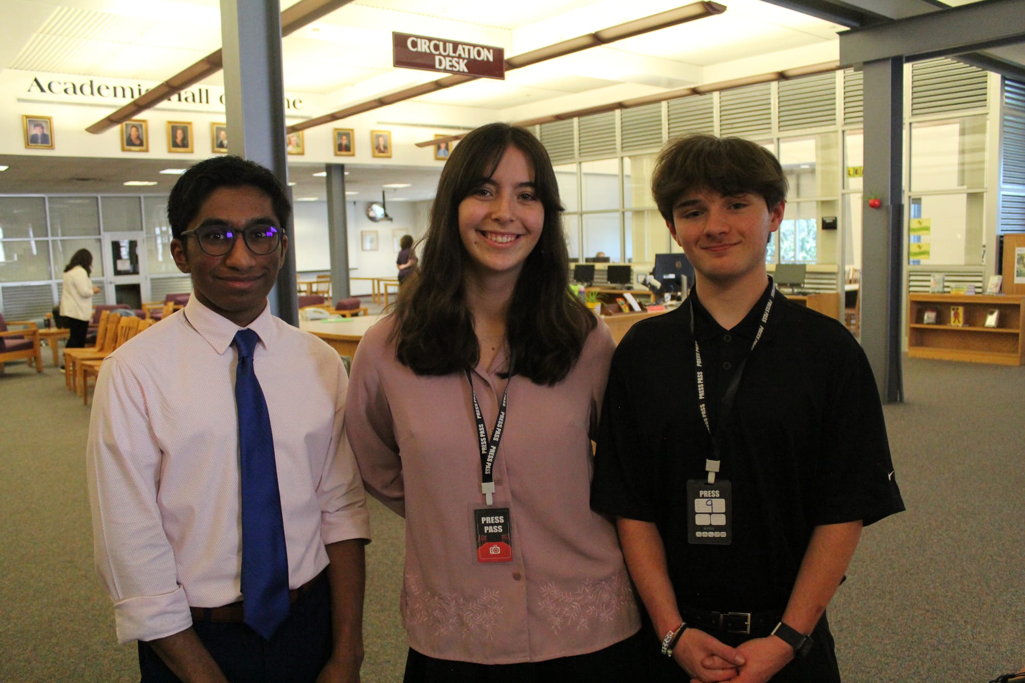 "The Stinger" staff (left to right) Ayan Shah, Carina McCallum, and Gabe Myers at the event Thursday