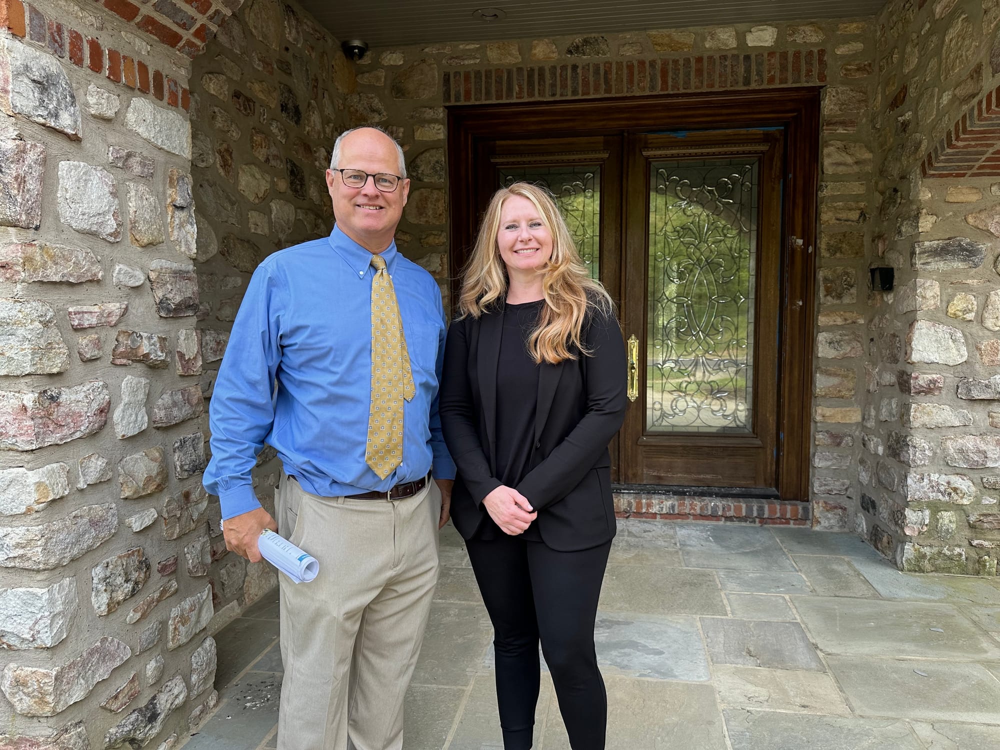 Bob Dann and Michelle Hunsberger of Tranzon/Sanford Alderfer Real Estate pose for a photo. They are responsible for the aucti