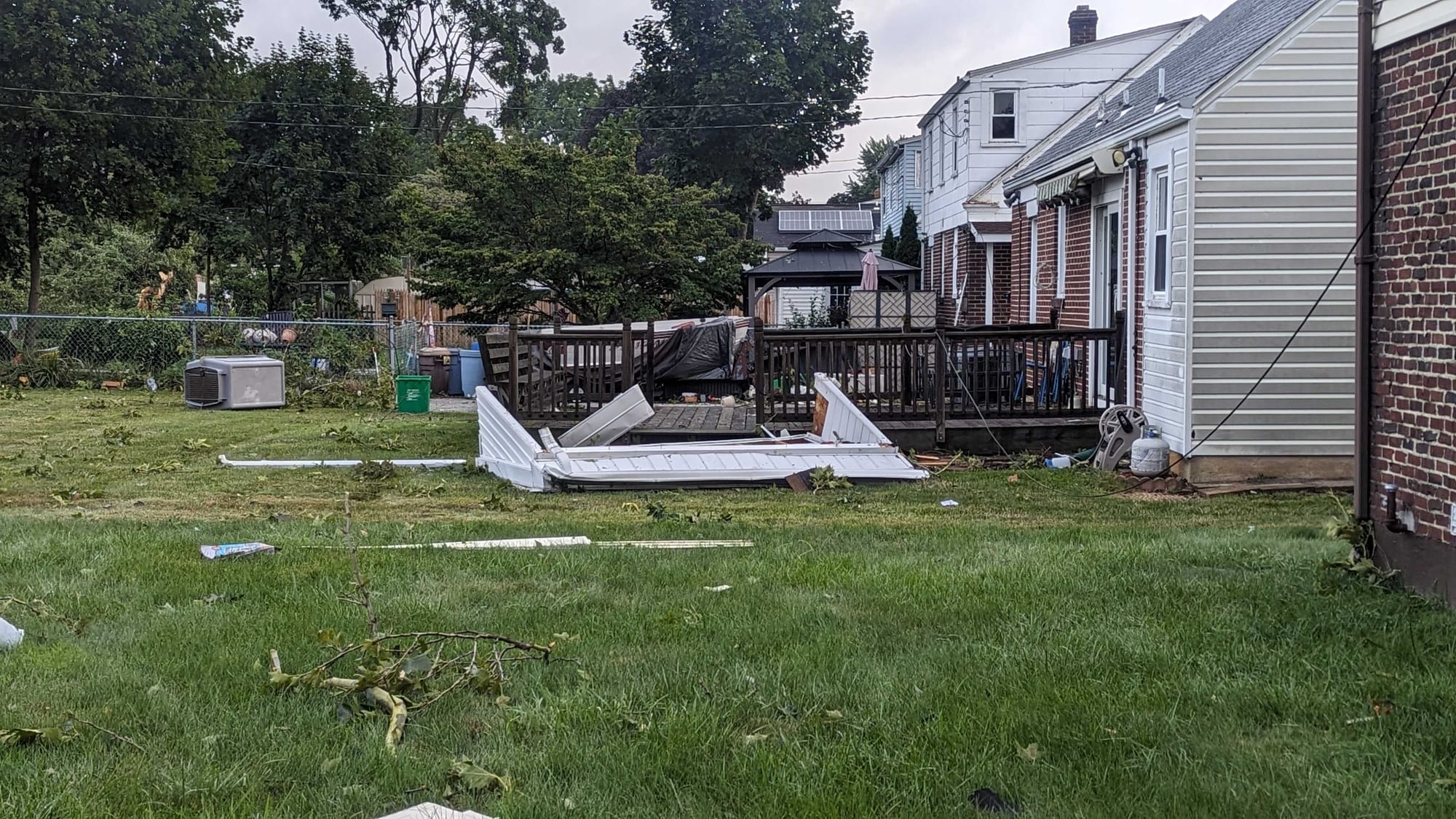 Roof of Belle's porch is two houses away.