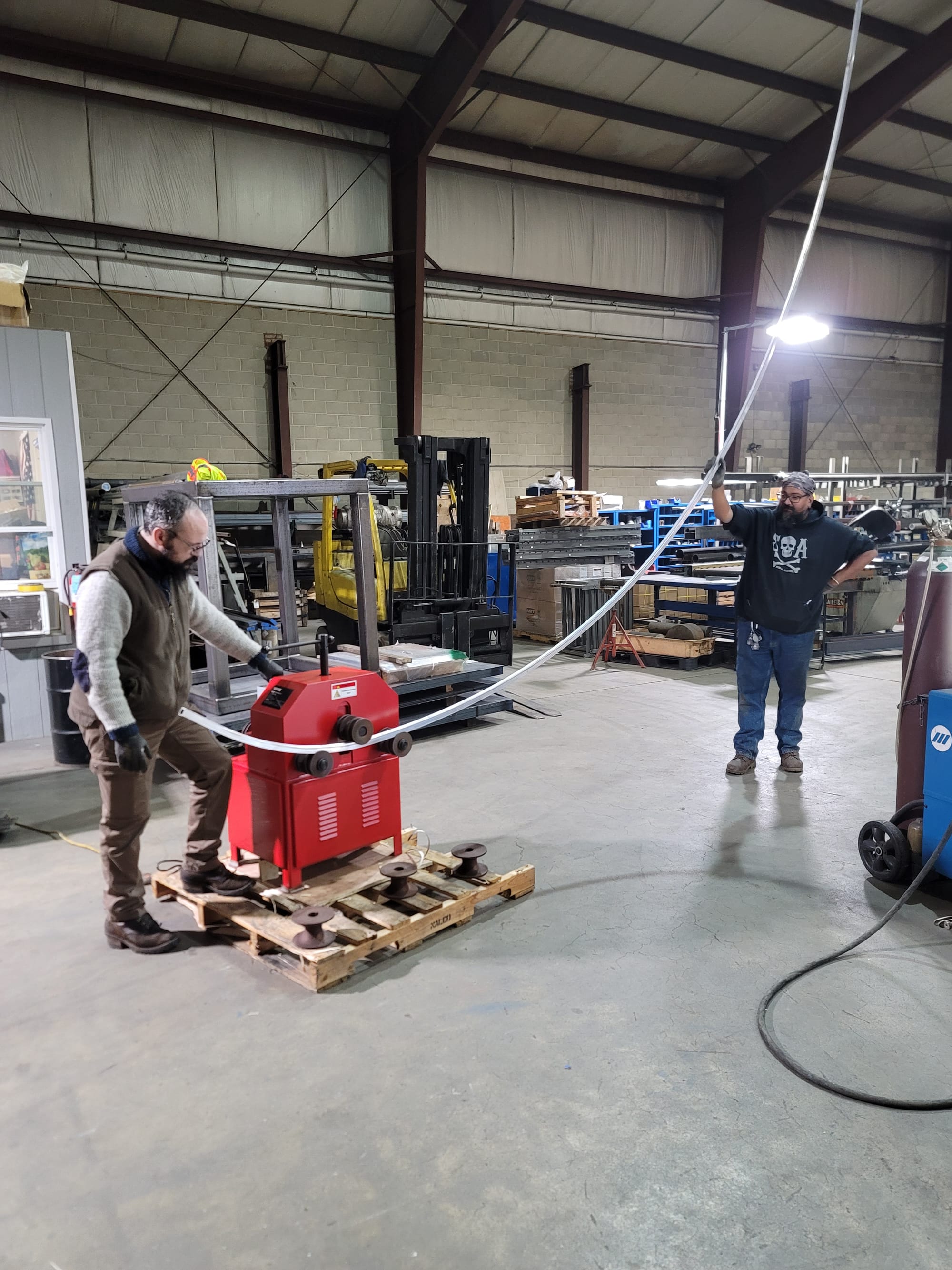 Workers at Richmond Machine & Welding work on building an enormous hockey puck at the shop in Hanover Township, Northampton C