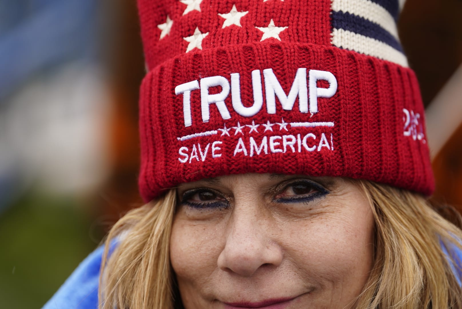 People gather ahead of Donald Trump's rally in Schnecksville, Pa. on Saturday, April 13, 2024.