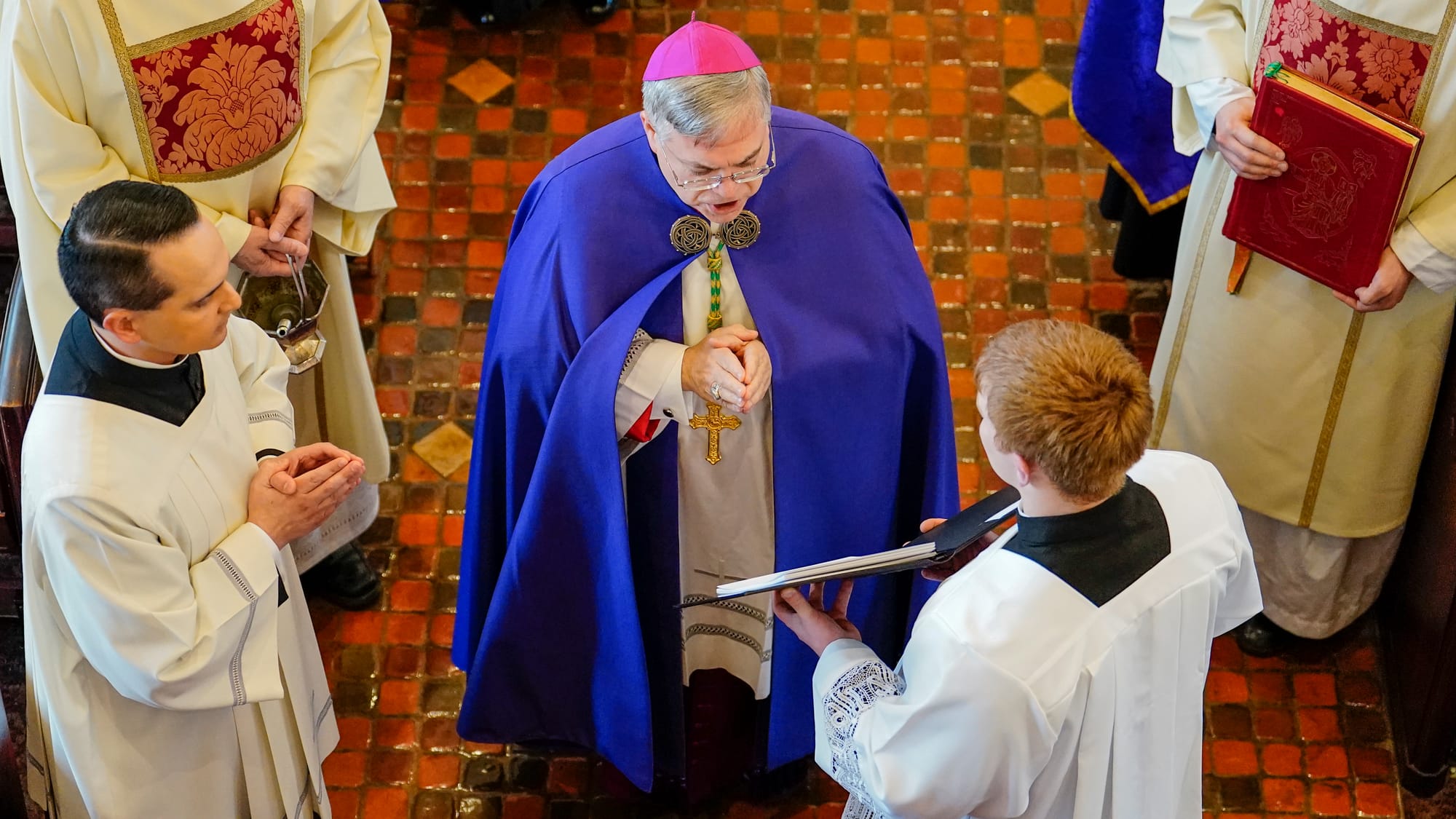 Bishop Alfred Schlert leads ceremonies Thursday. Ceremonies of Reception of the Body and Visitation for The Most Reverend Edw