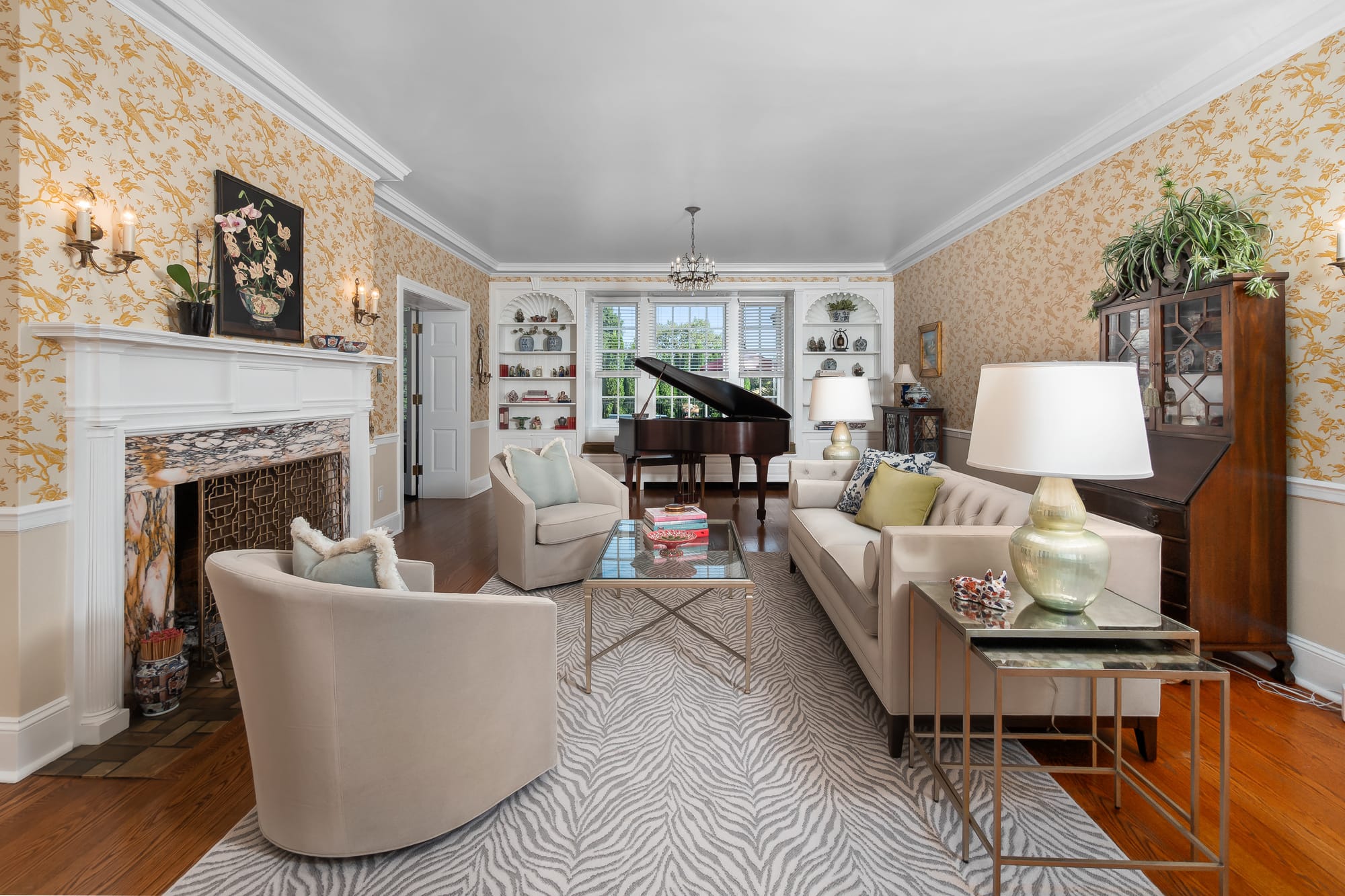 The 3-story Federal-Style Georgian Colonial mansion at 1880 W Union Boulevard sits on 1.27 acres and boasts a grand staircase