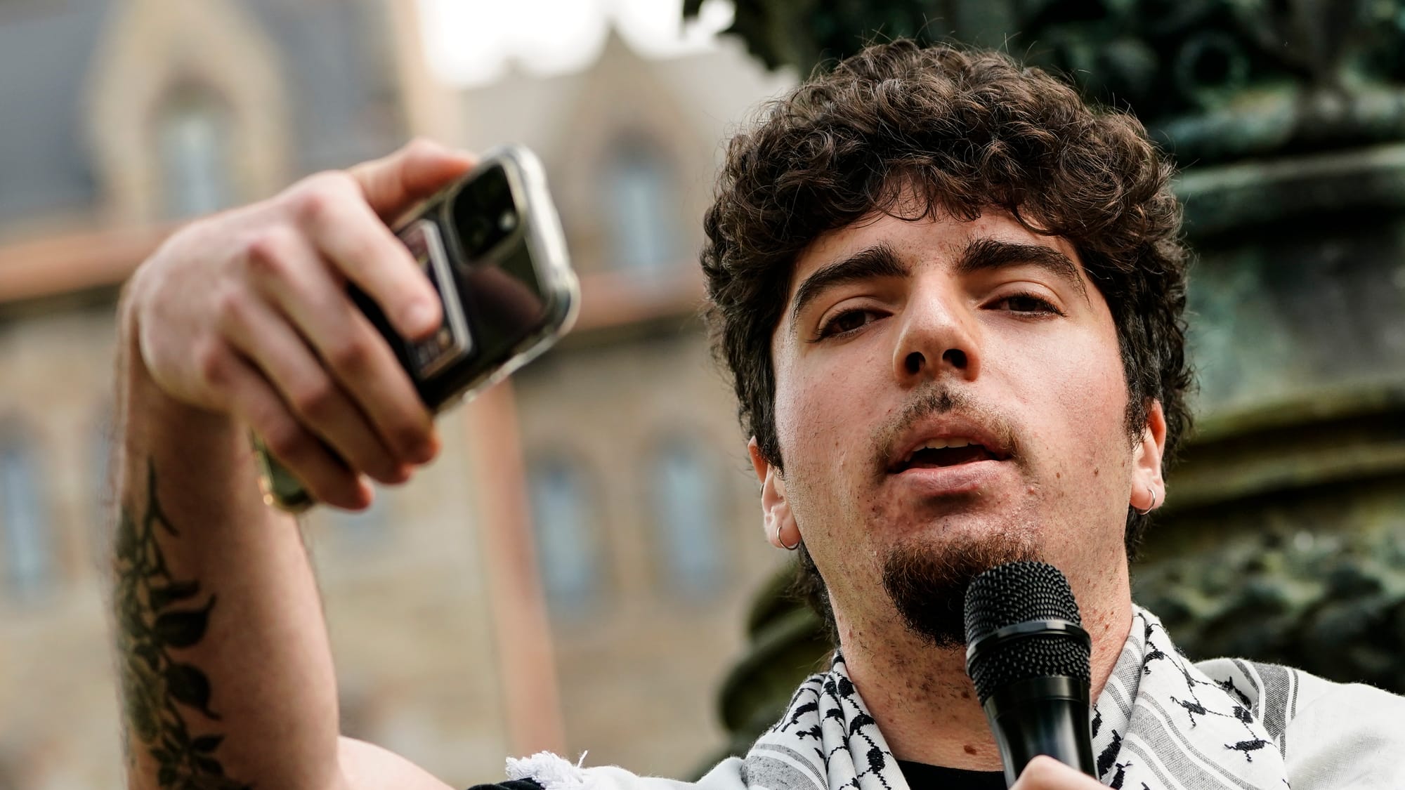 Ciaran Buitrago, a Lehigh junior, leads the rally Friday. Student Political Action Coalition and Lehigh 4 Palestine hold a ra