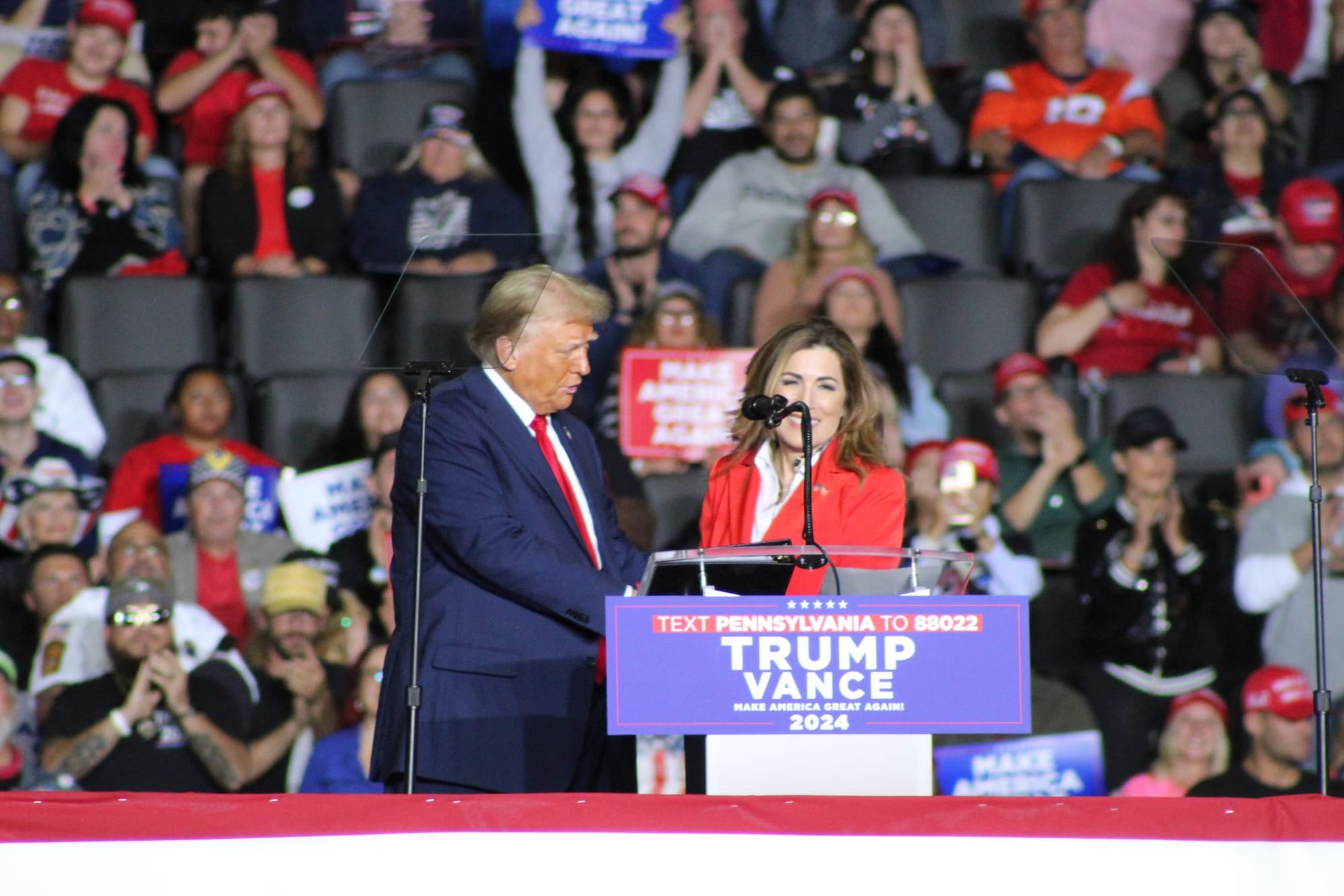 Former President Donald Trump on stage with Zoraida Buxo, Puerto Rico’s Republican shadow senator, at the PPL Center.