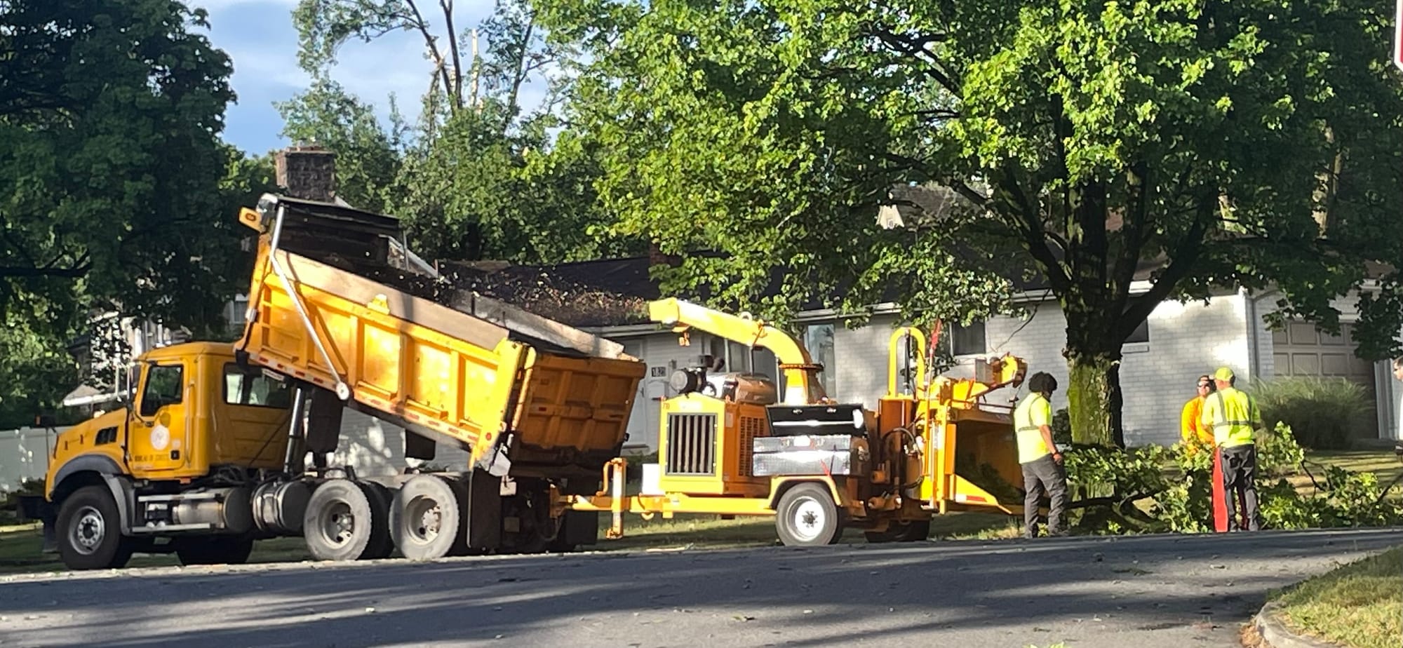 City workers along W. Union Blvd. in west Bethlehem begin the long process of cleaning up after Wednesday night’s powerful st