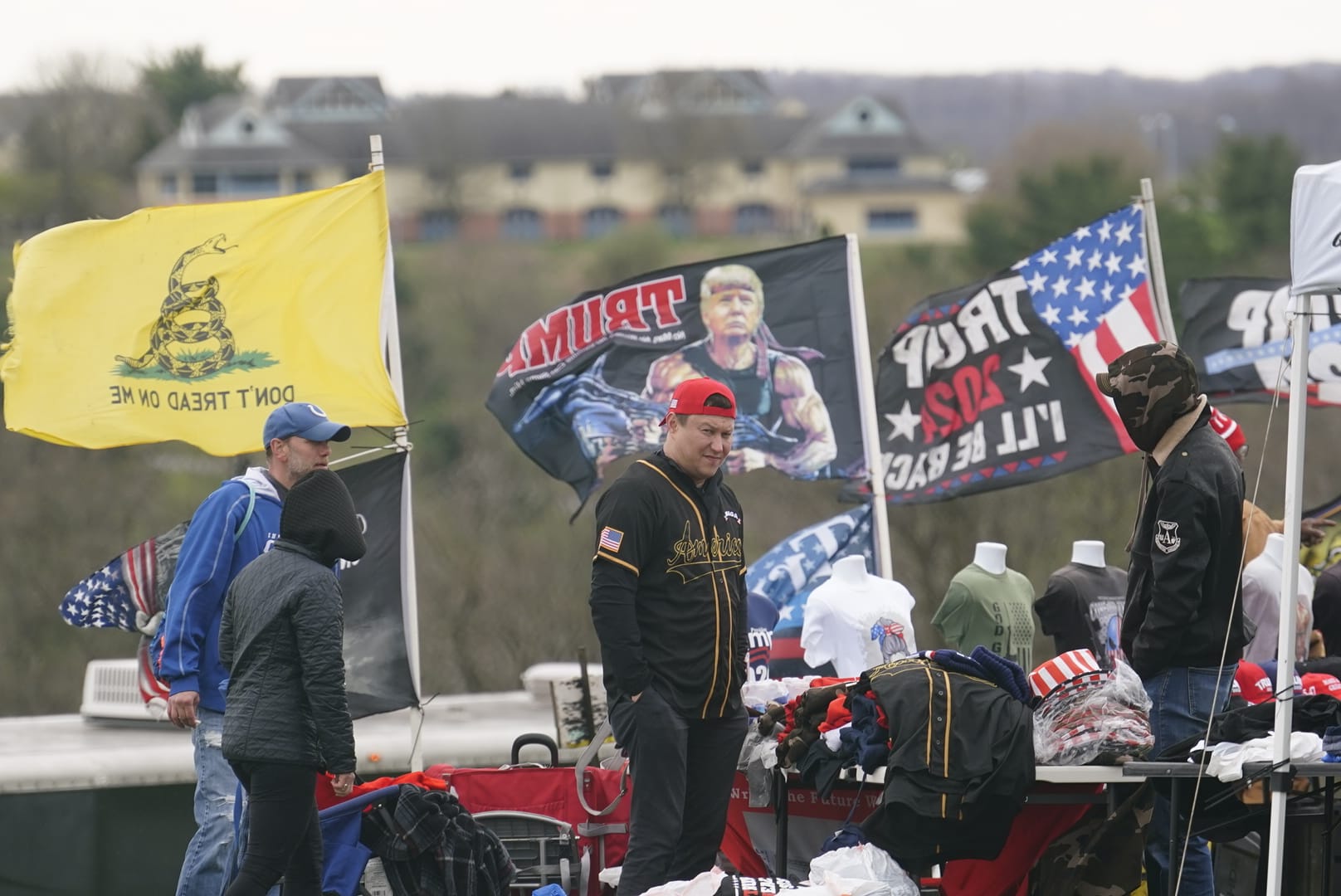 People gather ahead of Donald Trump's rally in Schnecksville, Pa. on Saturday, April 13, 2024.