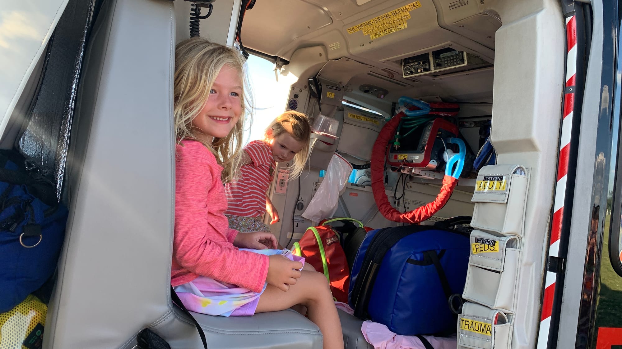 Kids sit in a police helicopter at Upper Macungie's National Night Out event.