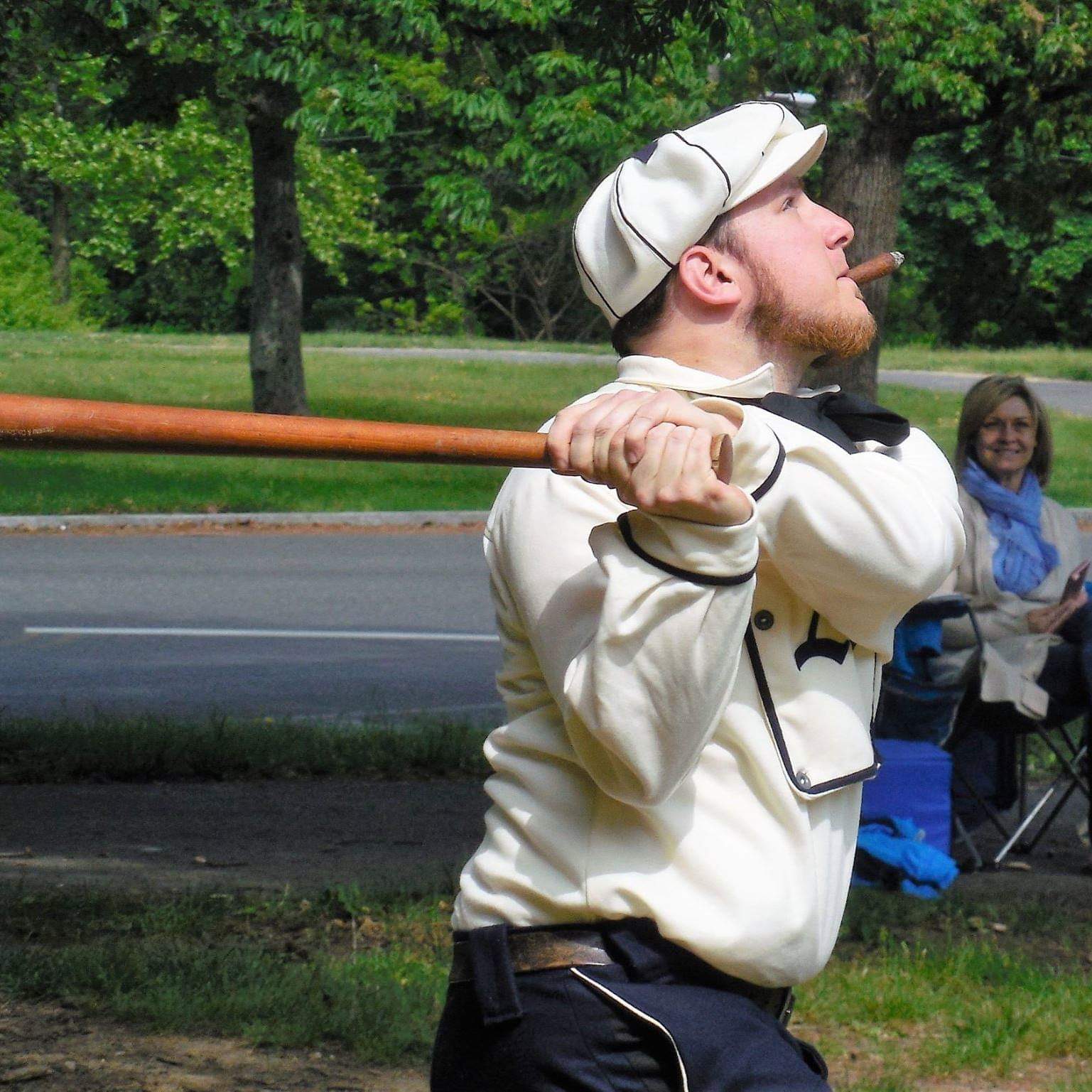 Matt Albertson, team president, takes a swing and puts it in play.