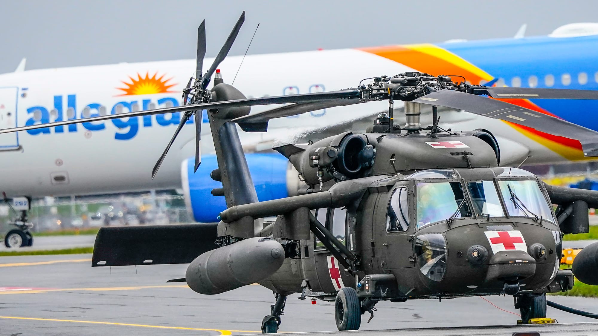 UH-60 Blackhawk helicopters from from Fort Drum in Jefferson County, New York, land at Lehigh Valley International Airport on